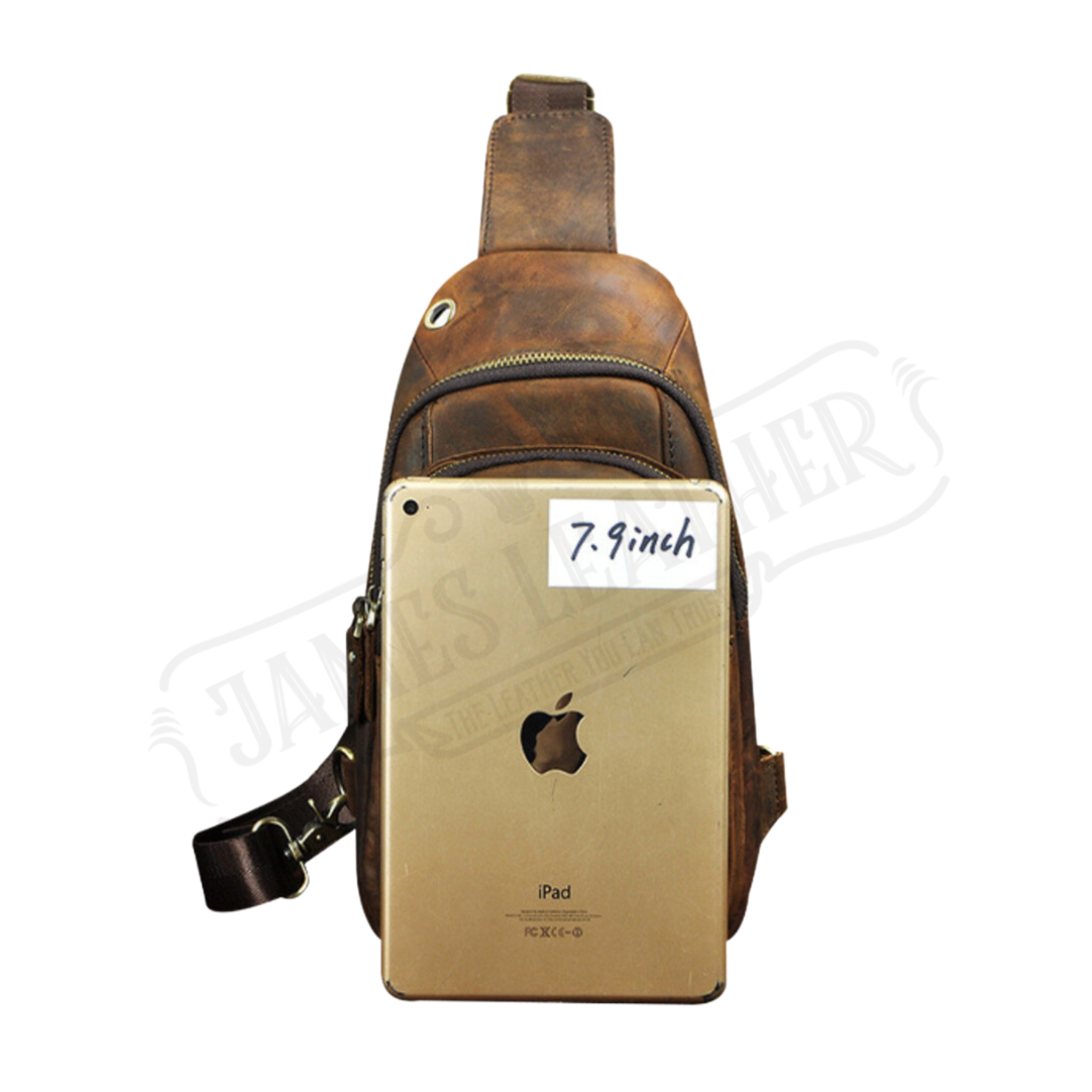 Brown leather sling bag with an iPad on a white background