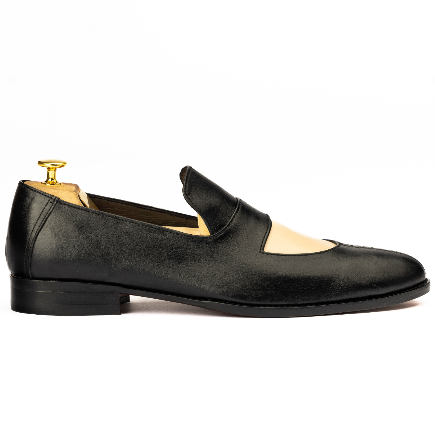 Black loafer shoe on a white background