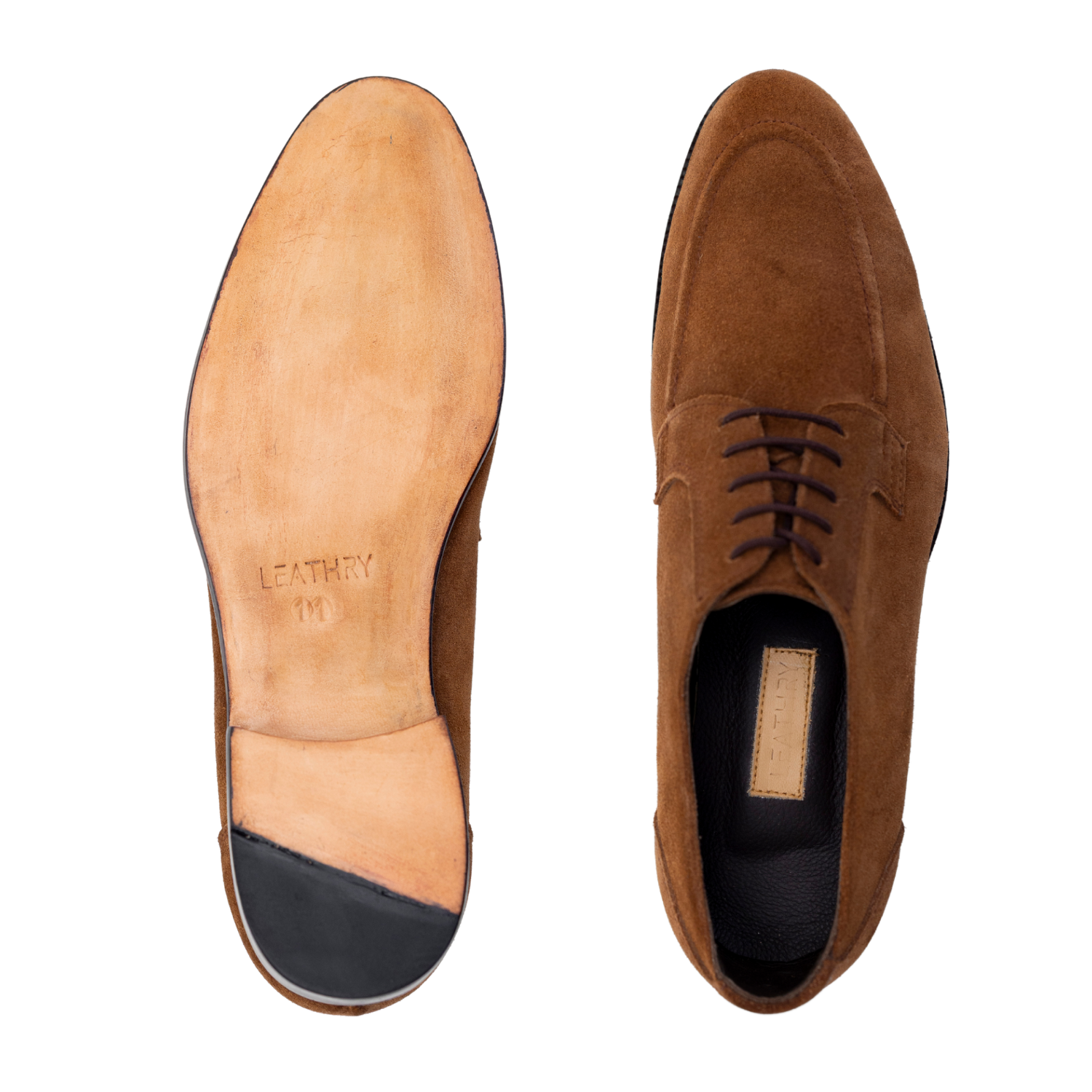 Brown suede shoes with a visible brand label on a white background