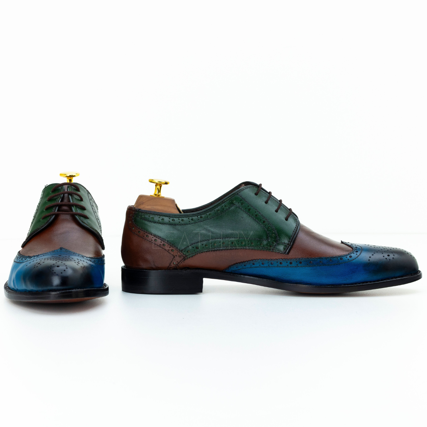 Pair of multicolored dress shoes on a white background