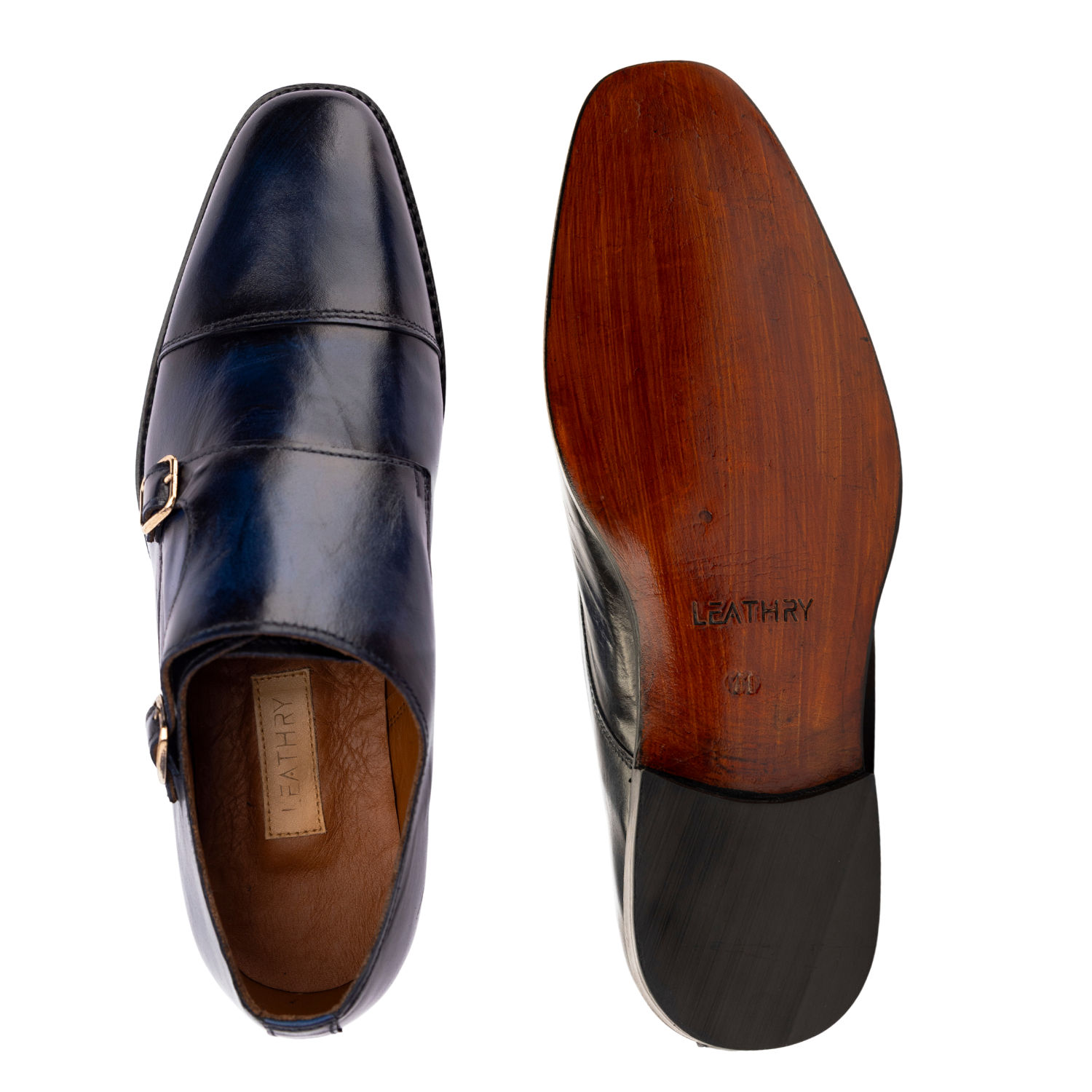Black leather dress shoes with wooden sole on a white background