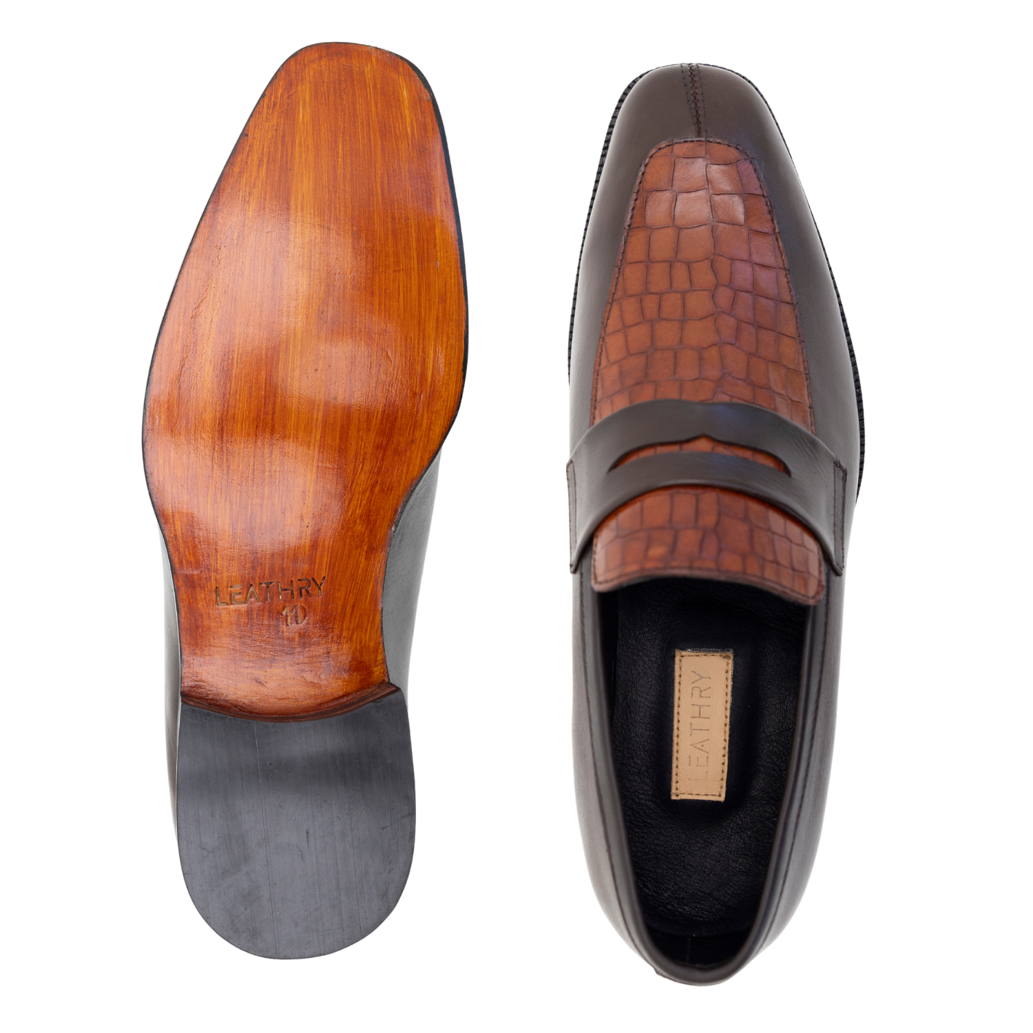 Brown leather loafer shoes with wooden sole on a white background