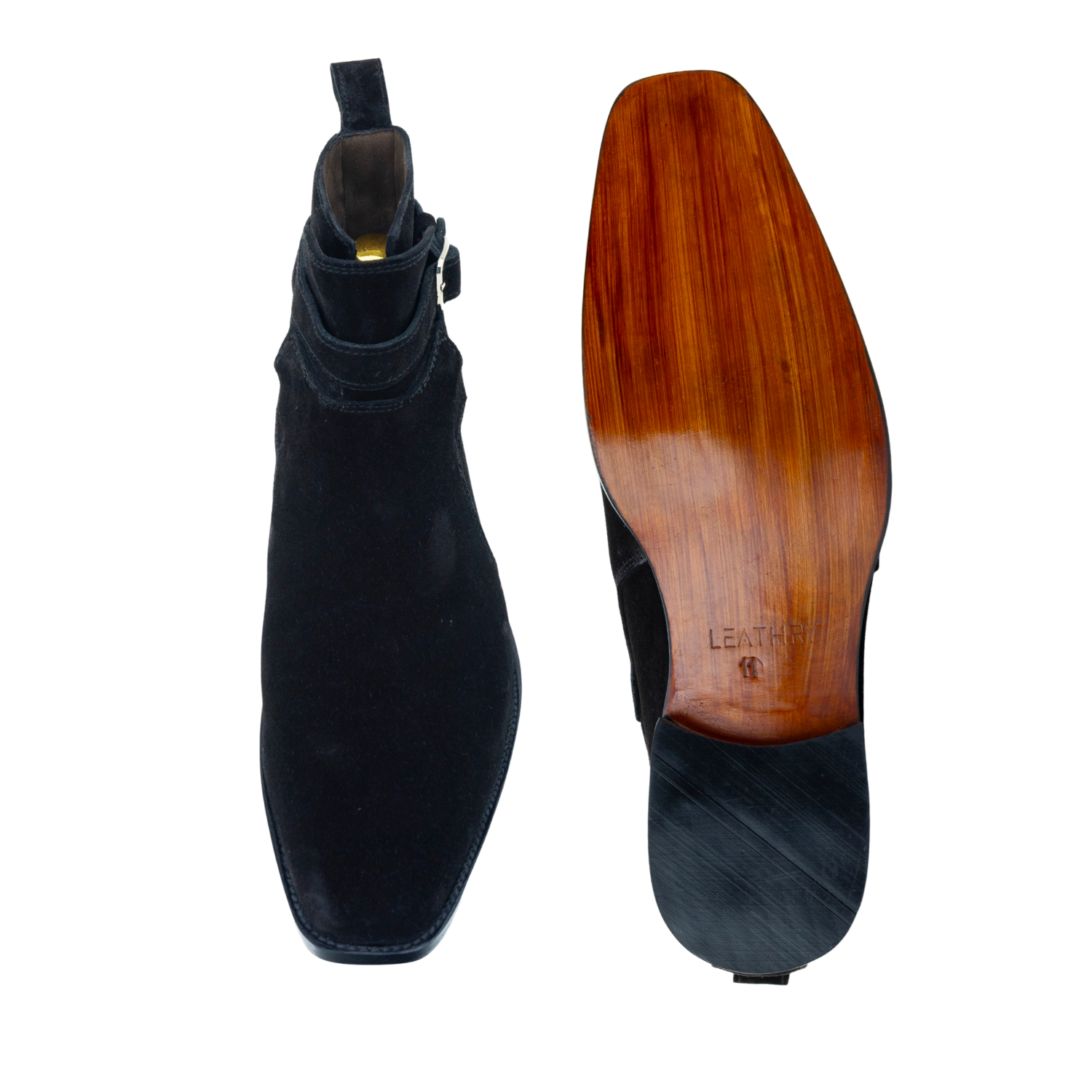 Black boot with wooden sole on a white background