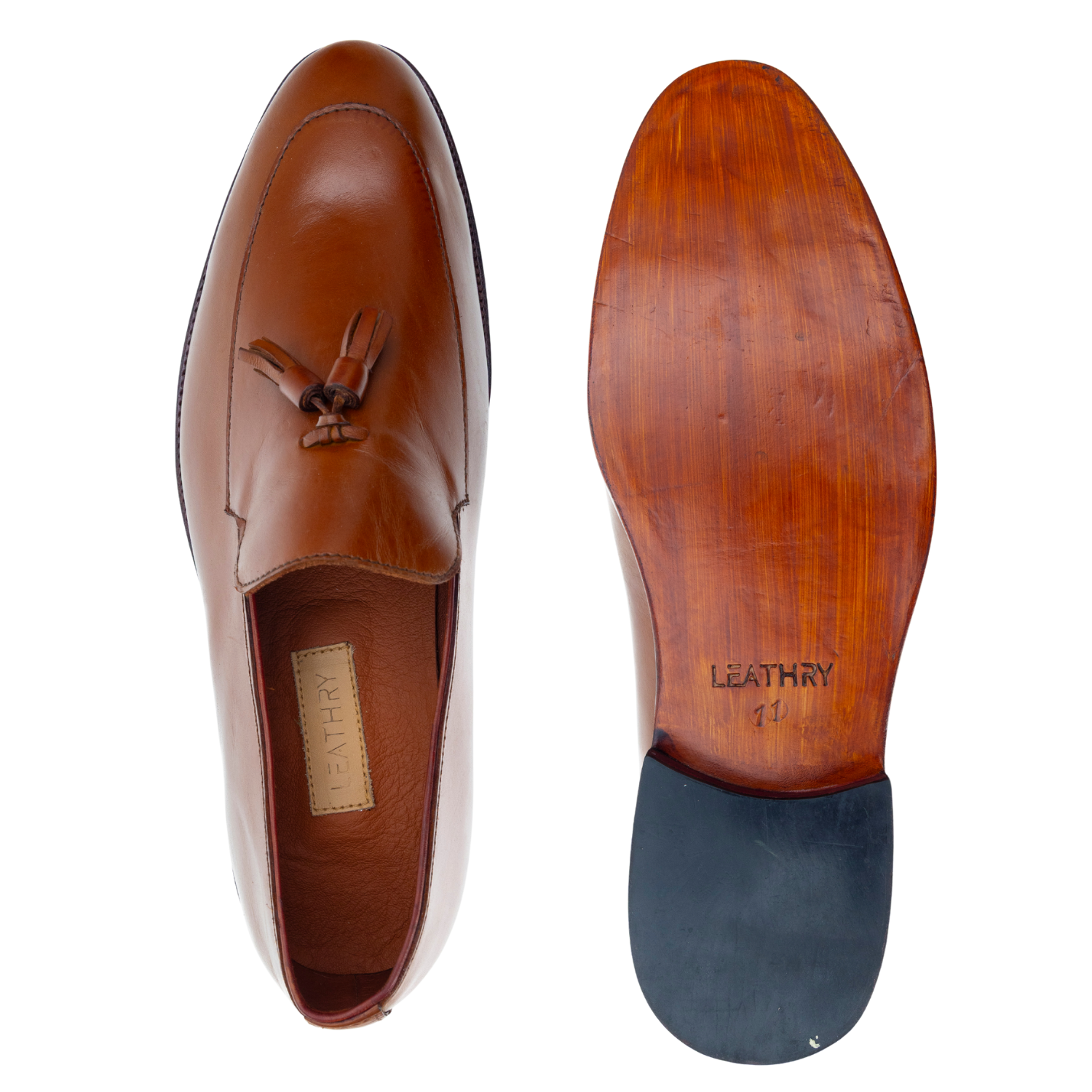 Brown leather loafer shoe with visible brand name on a white background