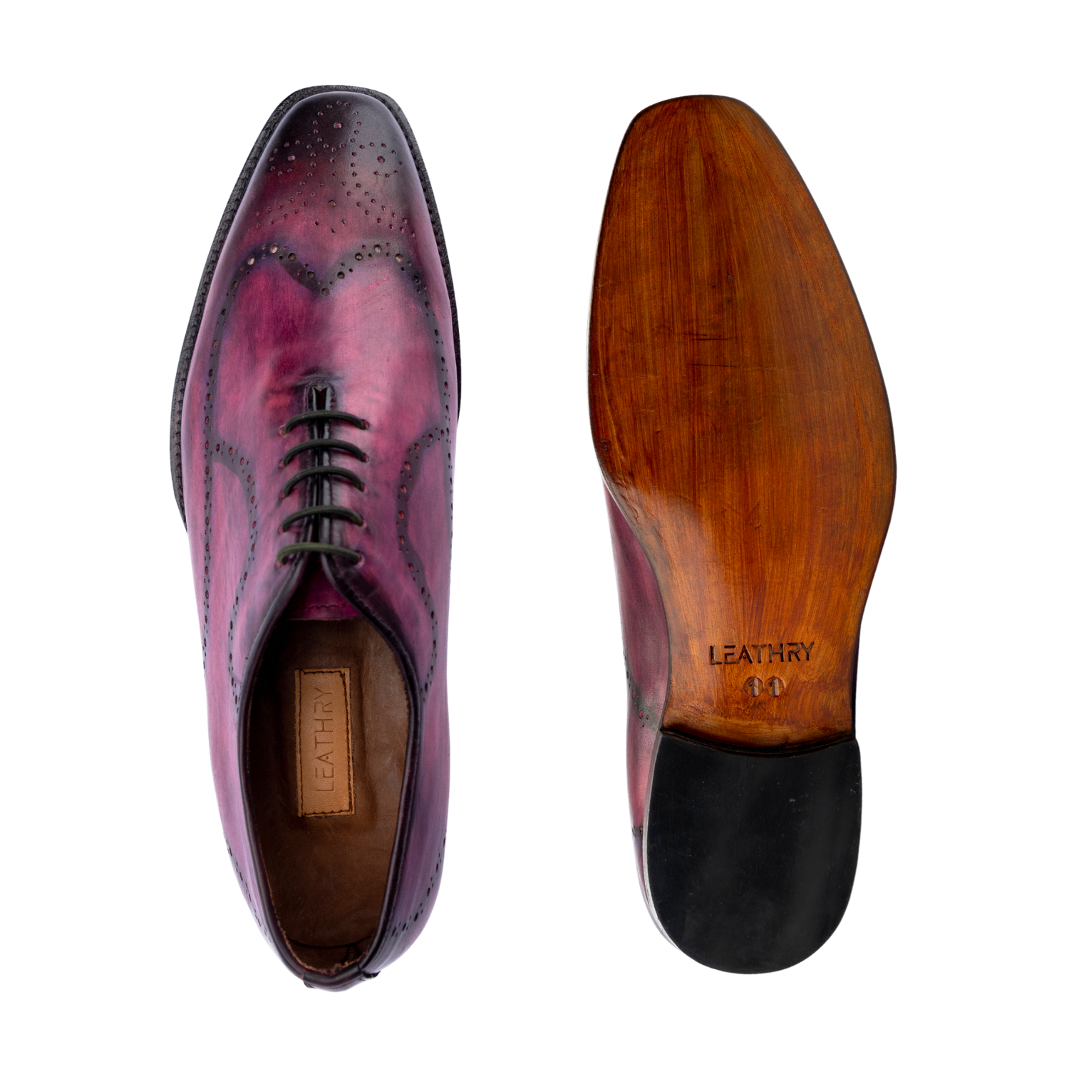 Purple leather shoe with wooden sole on a white background
