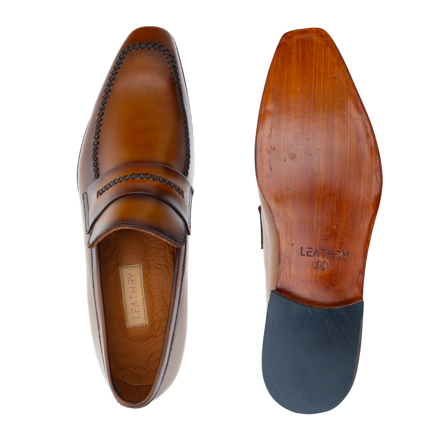 Brown leather loafer shoe with a focus on the sole and brand label.