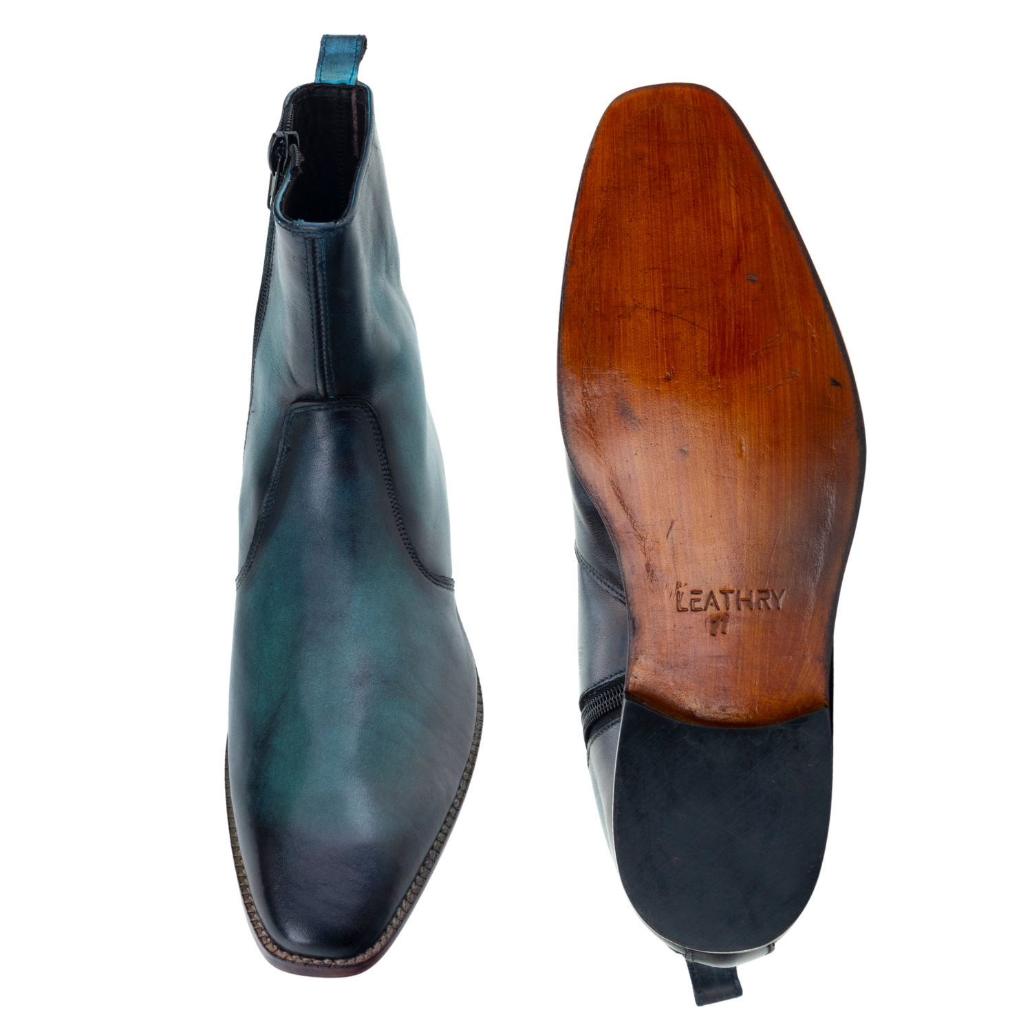 Black leather boot with wooden sole on a white background