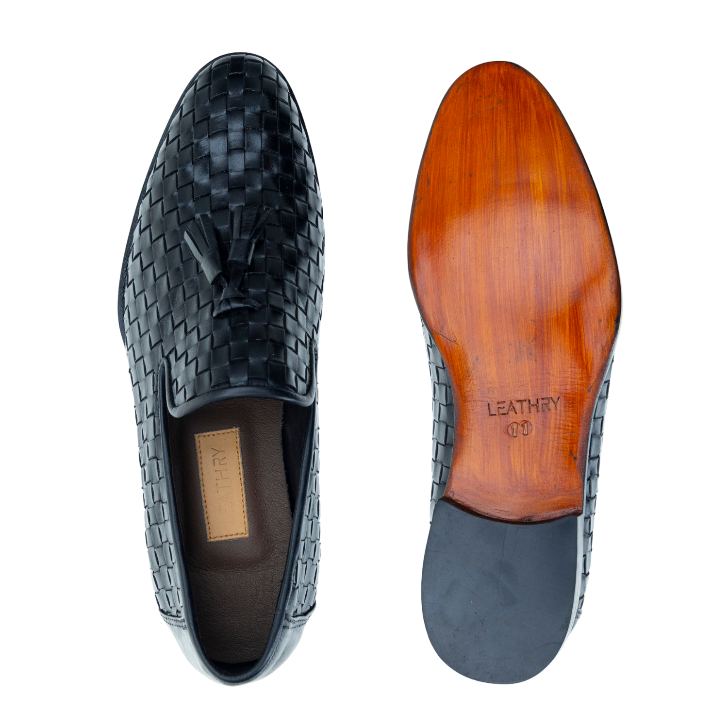 Black woven loafer shoe with wooden sole on a white background