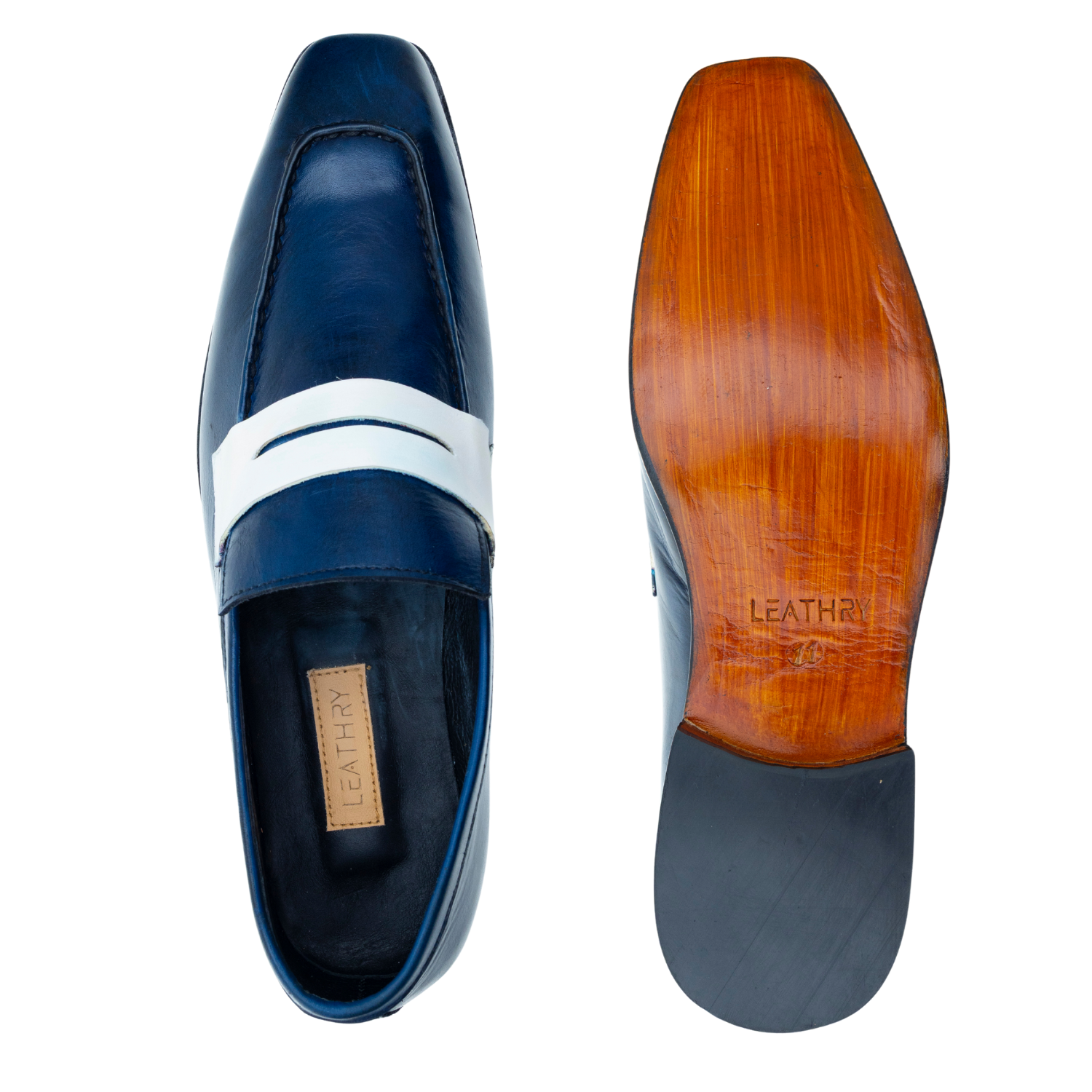 Blue loafer shoe with white band and wooden sole on a white background