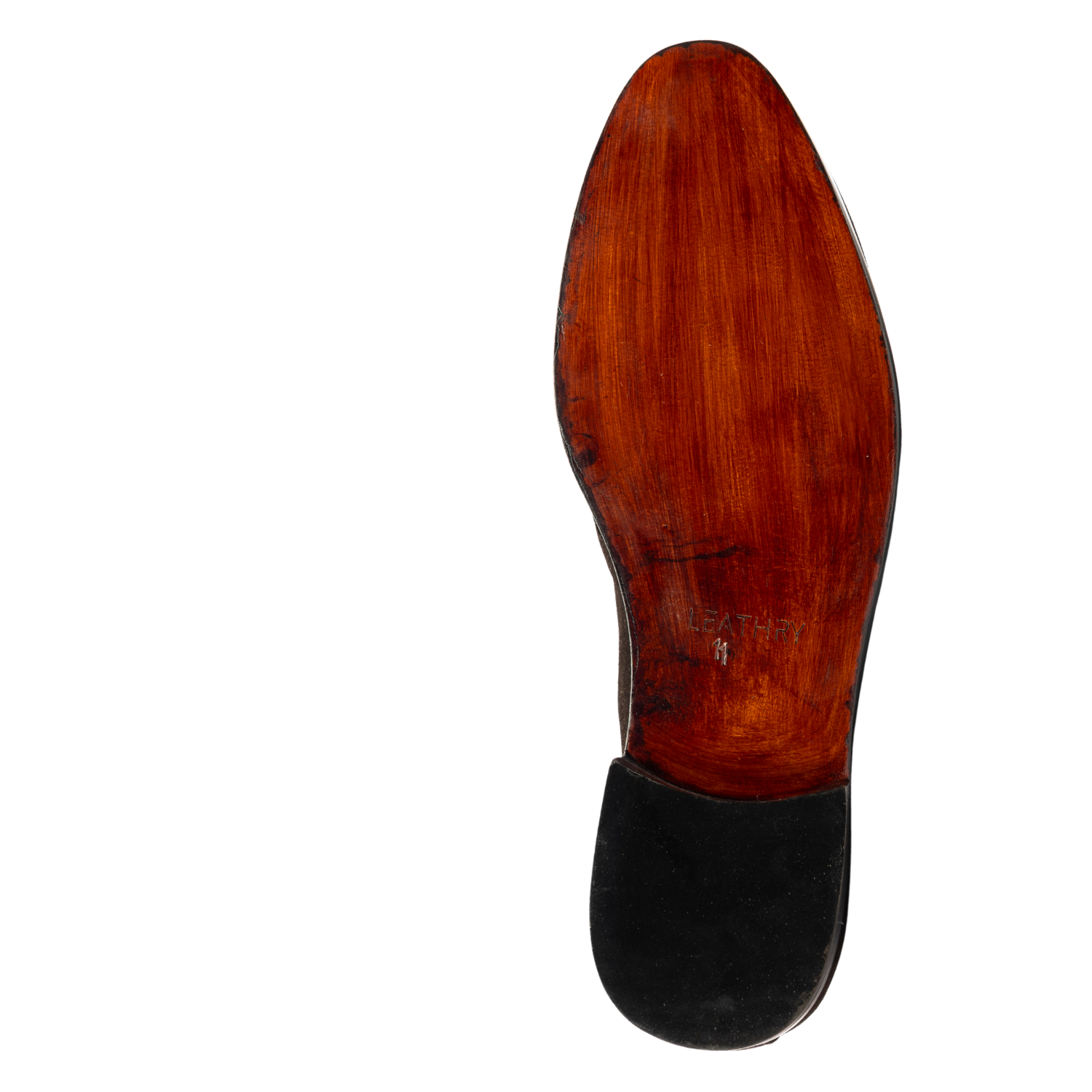 Wooden shoe outsole with black rubber sole on a white background