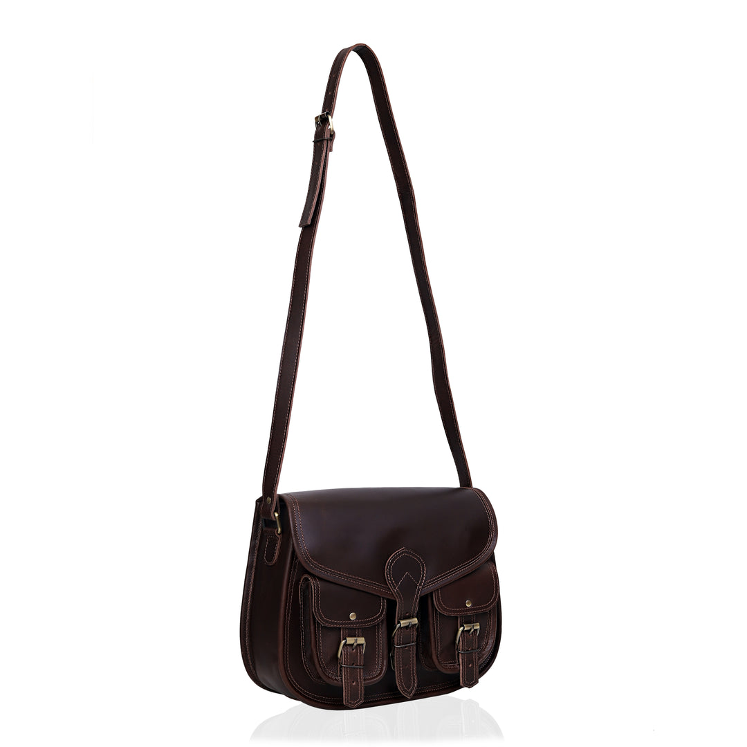 Brown leather shoulder bag on a white background