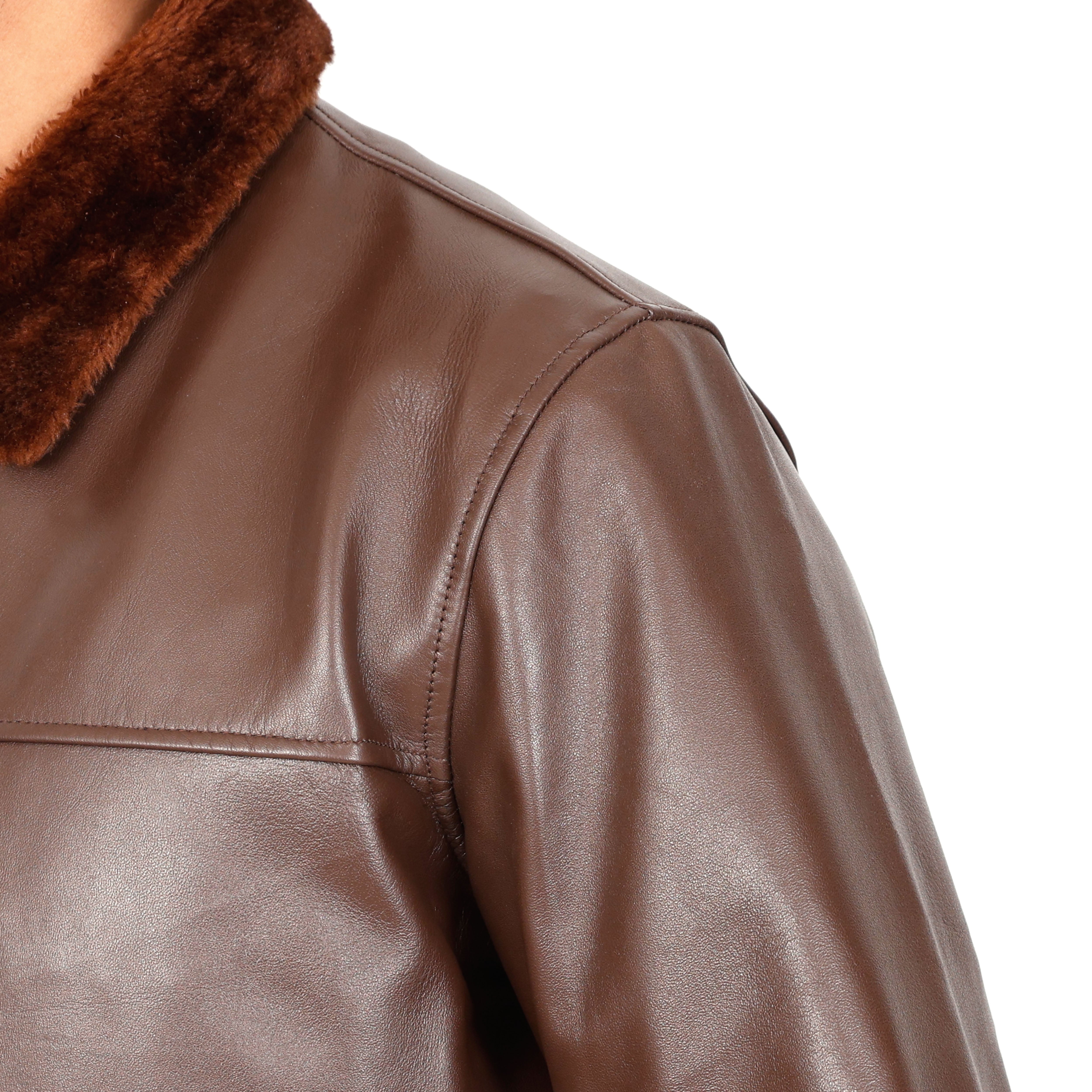 Brown leather jacket with fur collar on a white background