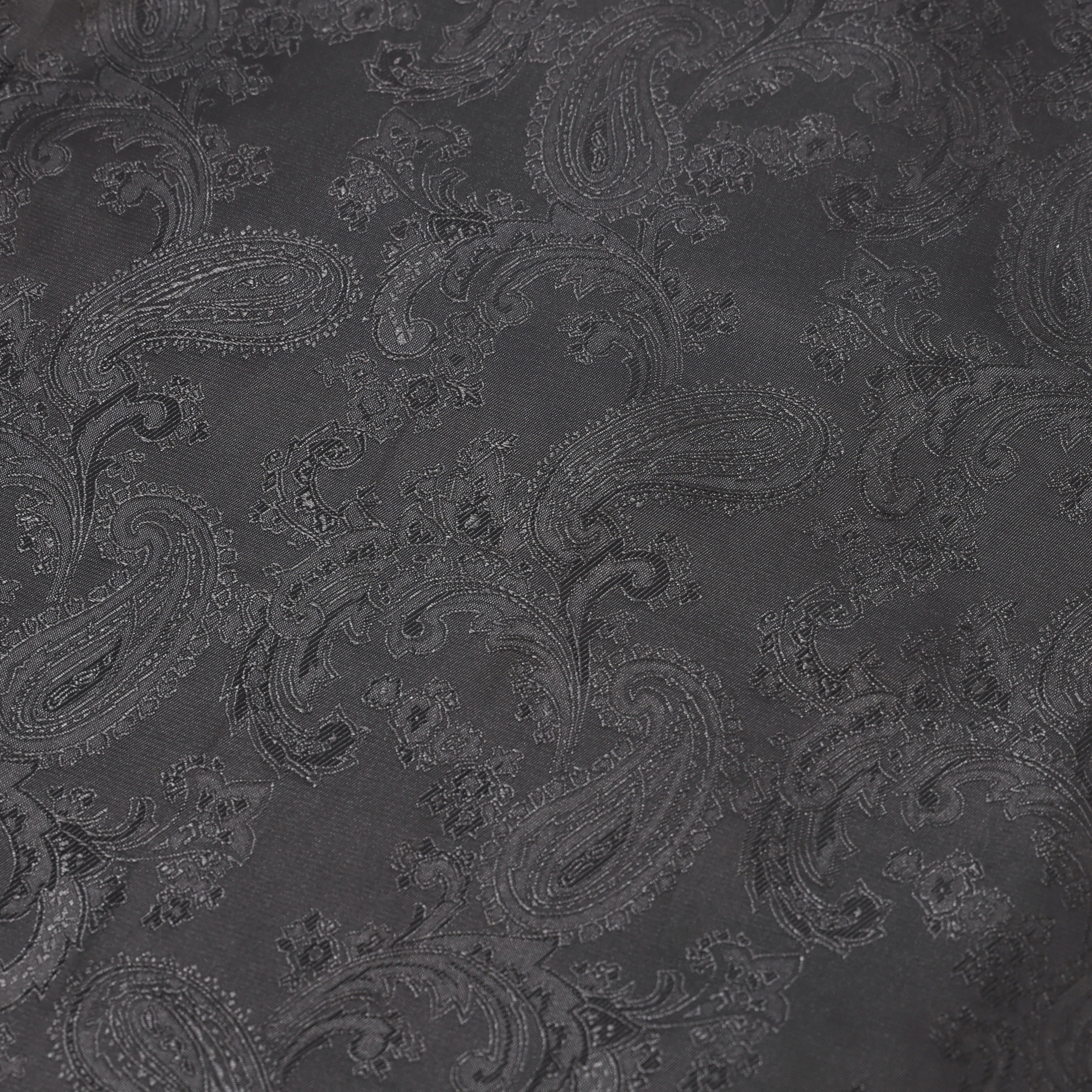Dark gray fabric with paisley pattern
