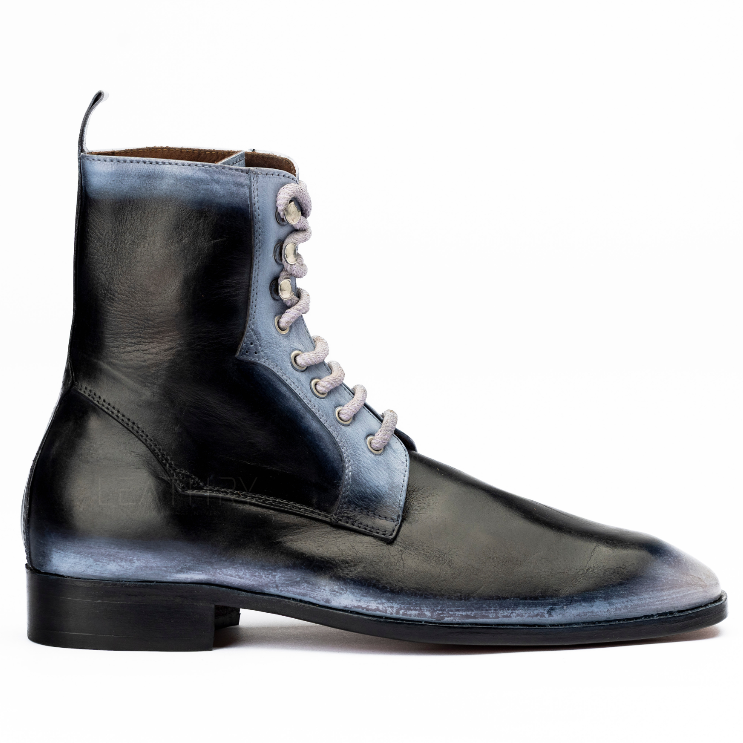 Black and blue leather boot with lace-up design on a white background