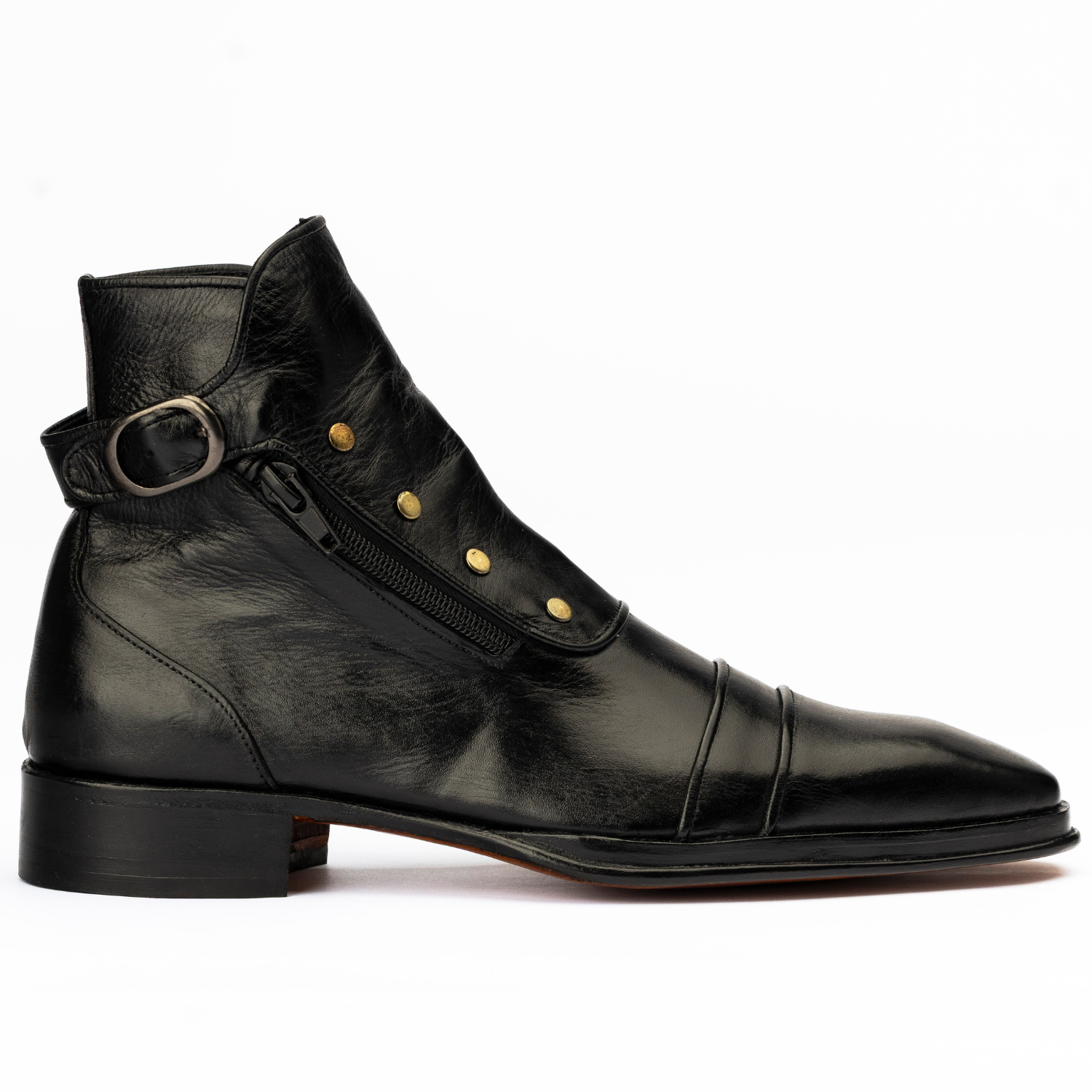 Black leather boot with gold buttons on a white background