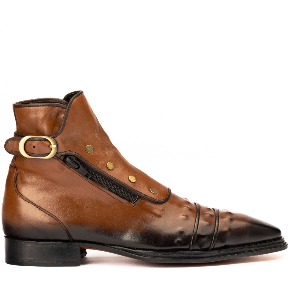 Brown leather boot with gold buckle and zipper on a white background