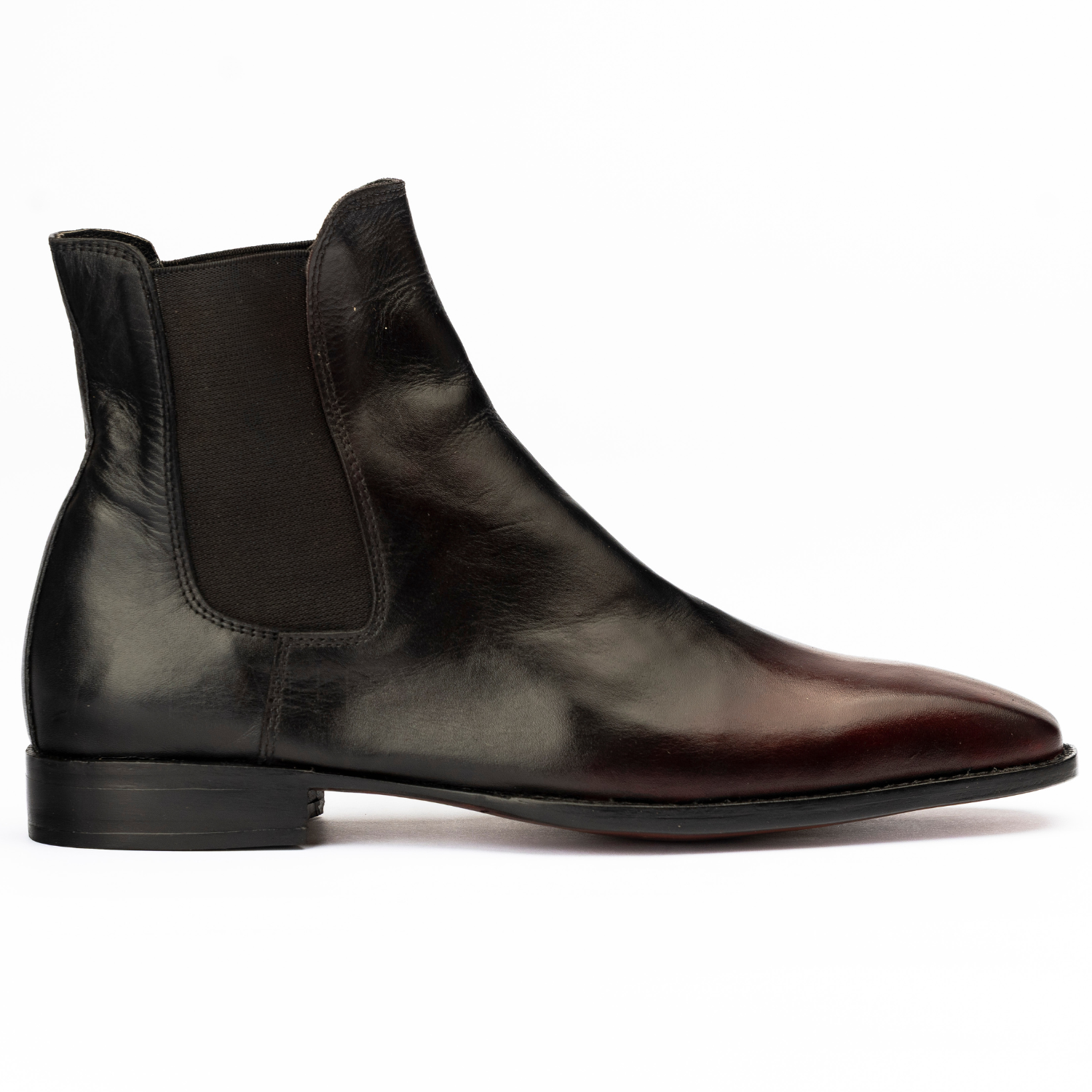 Black leather Chelsea boot on a white background