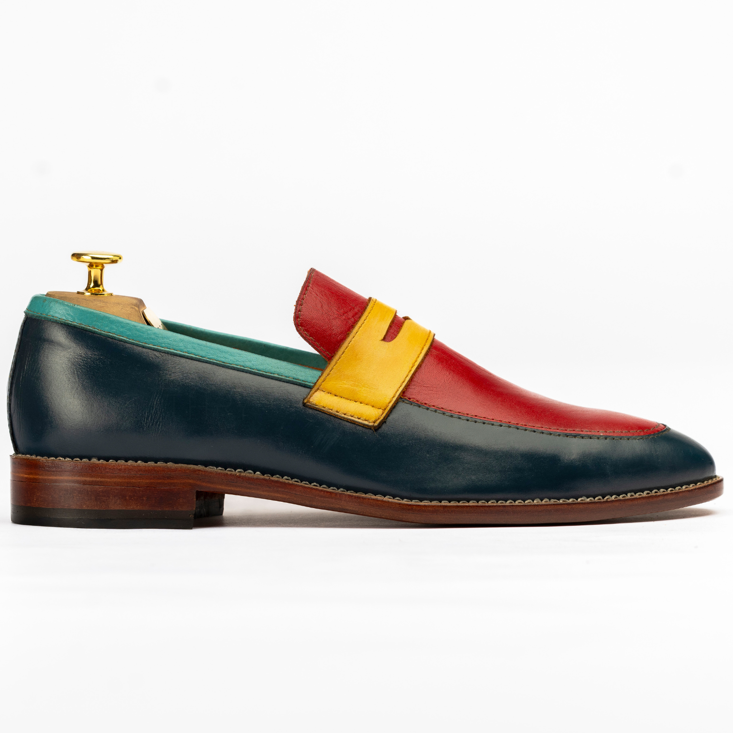 Multicolored loafer with a wooden sole on a white background