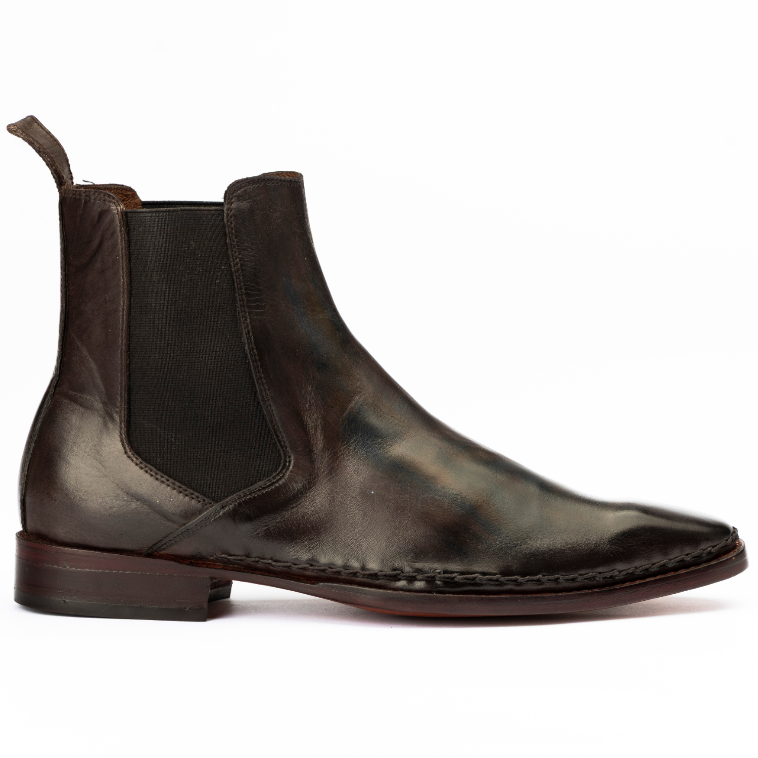 Brown leather Chelsea boot on a white background