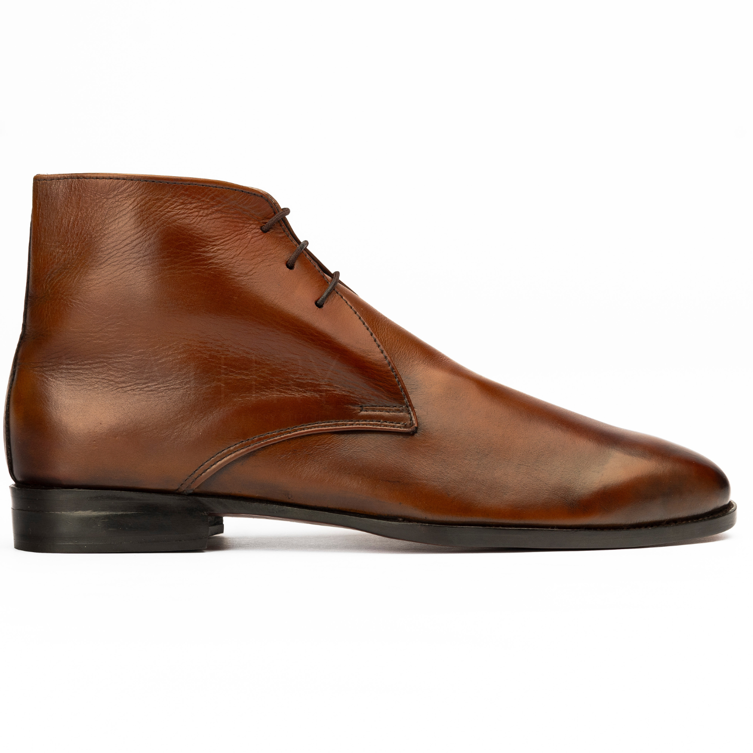 Brown leather shoe on a white background