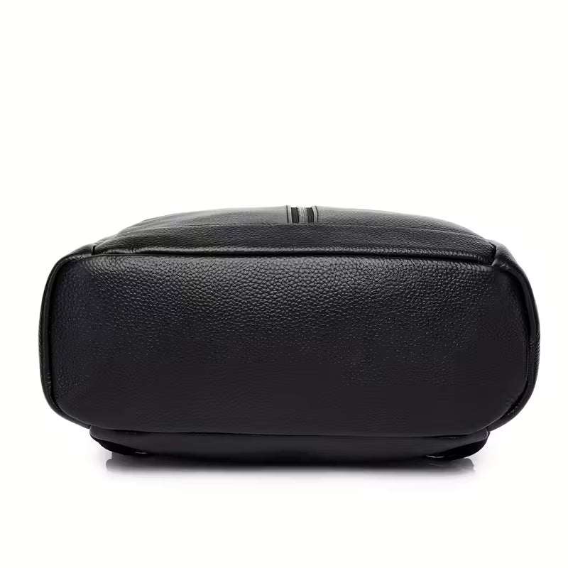 Black leather bag on a white background