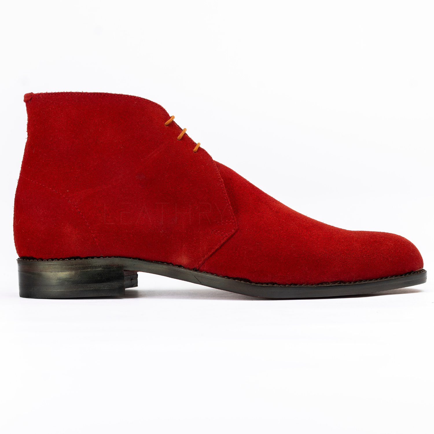 Red suede shoe on a white background