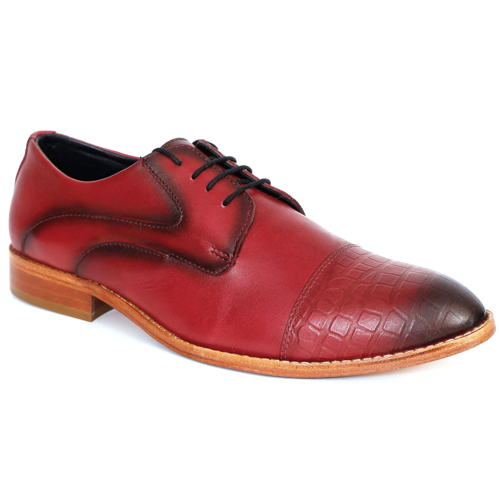 Red leather dress shoe with brown cap toe on a white background