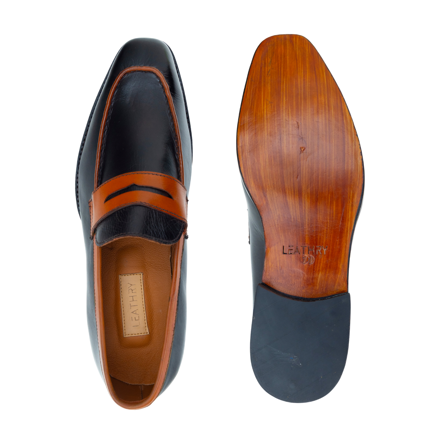 Black and brown loafer shoe with wooden sole on a white background