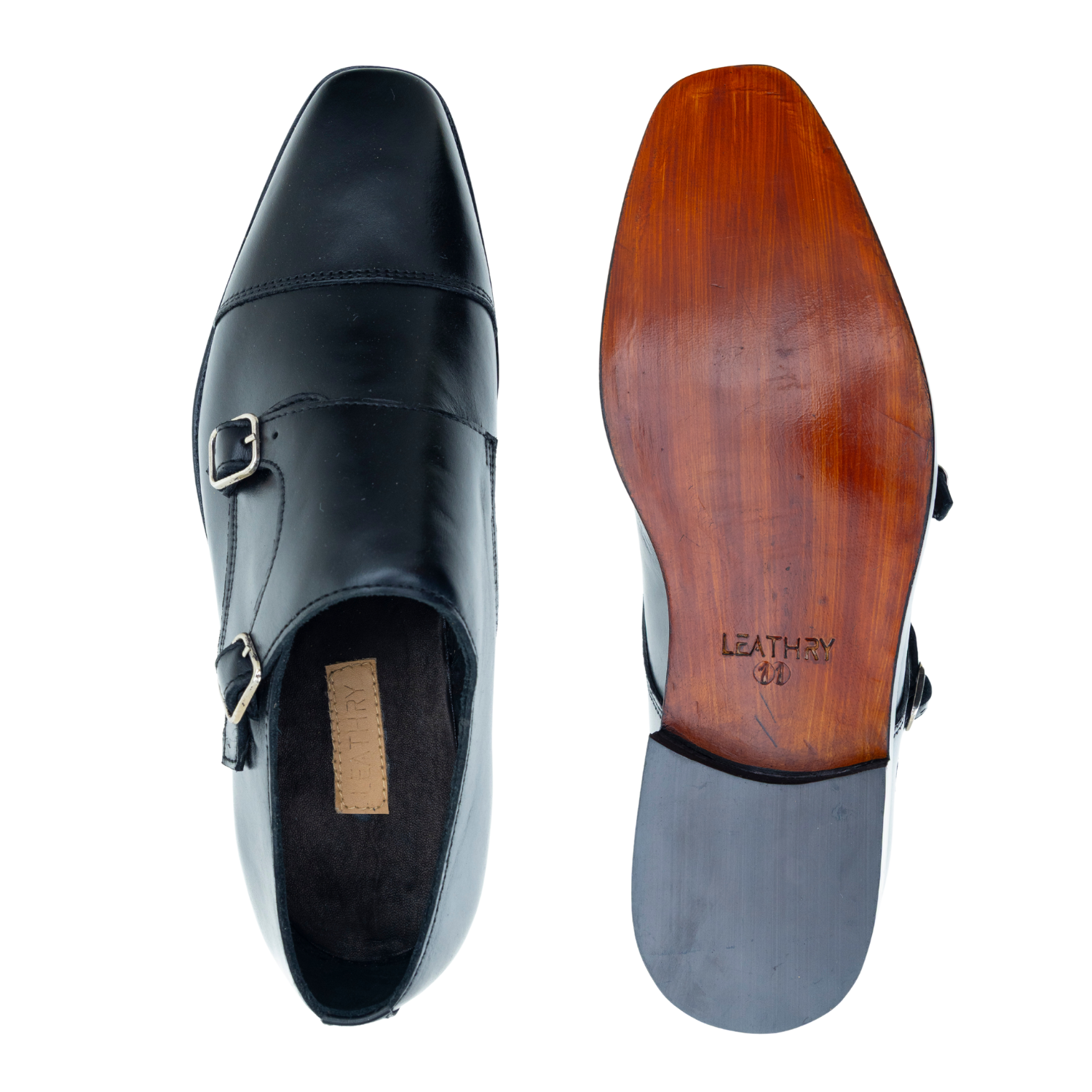Black leather shoe with wooden sole on a white background