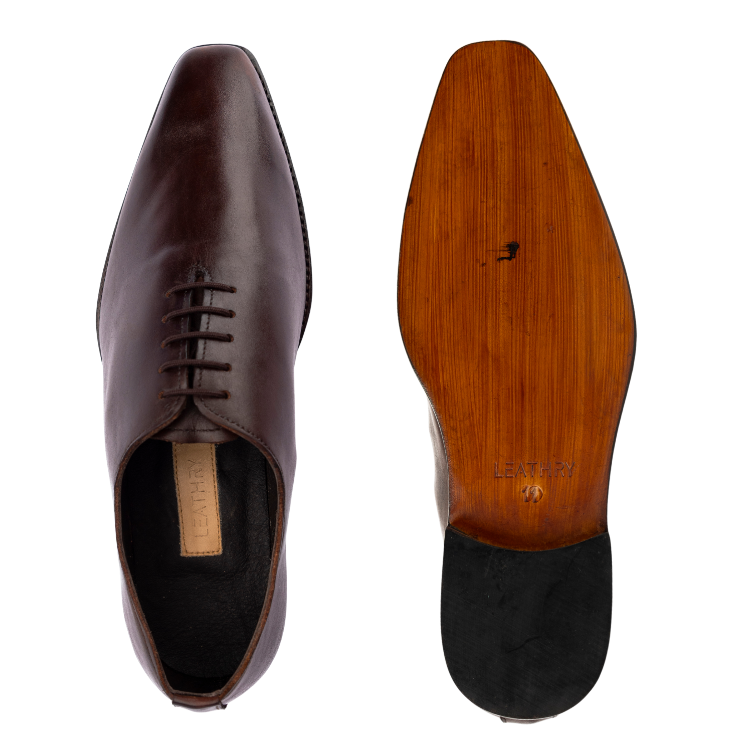 Brown leather dress shoe with a wooden sole on a white background