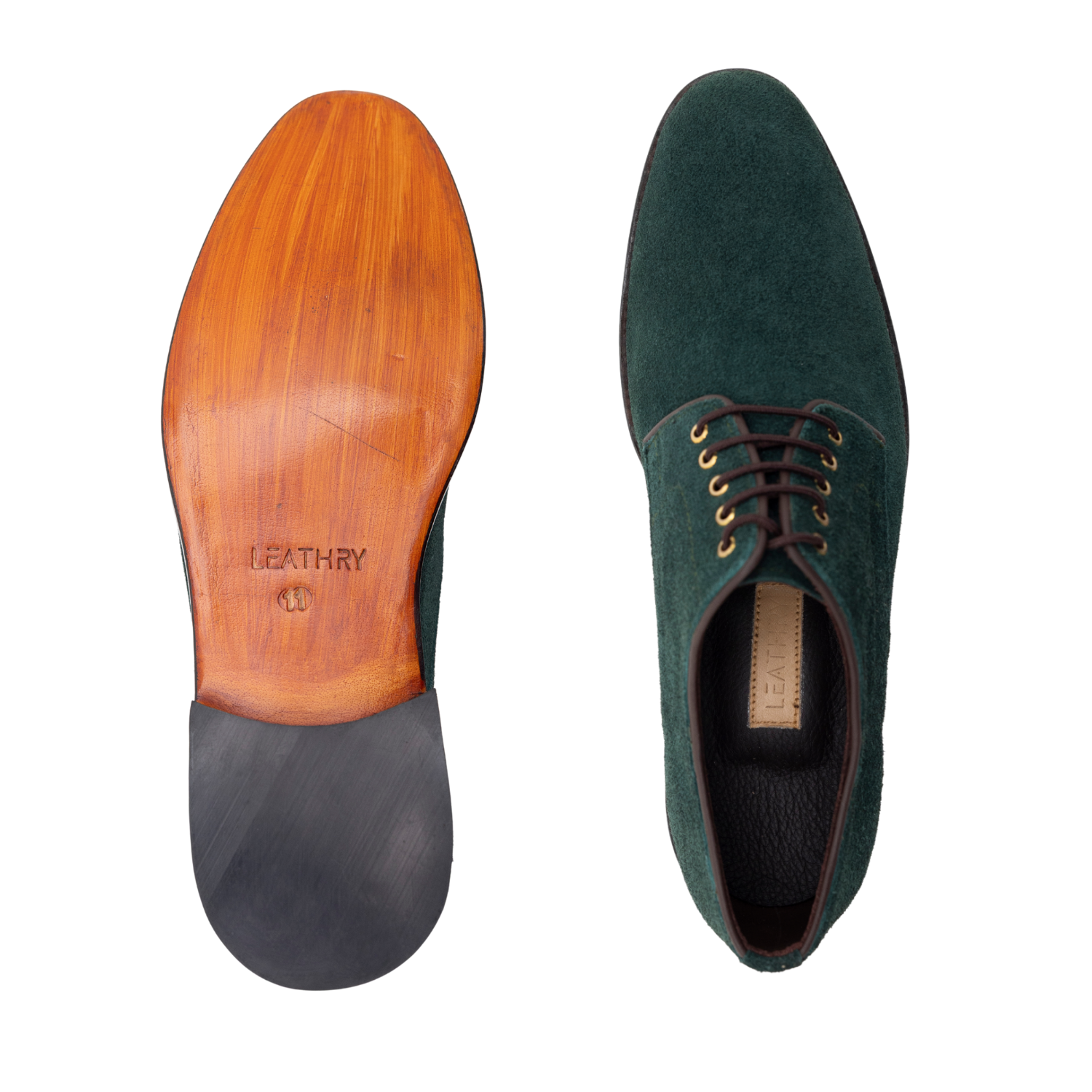 Green suede shoe with wooden sole on a white background