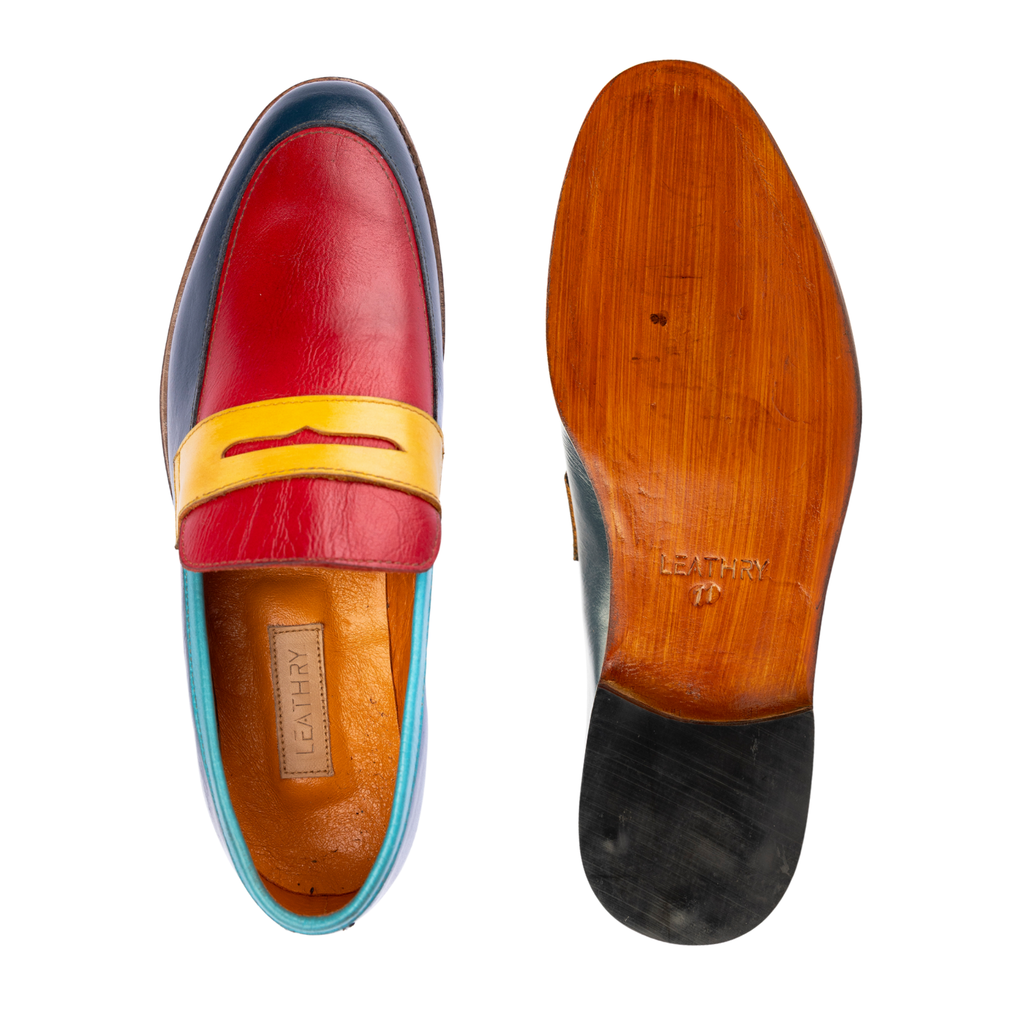 Colorful loafer shoe with a focus on the sole and brand name.