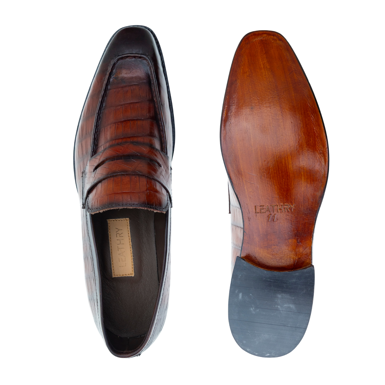 Brown leather loafer shoe with a visible brand name on a white background