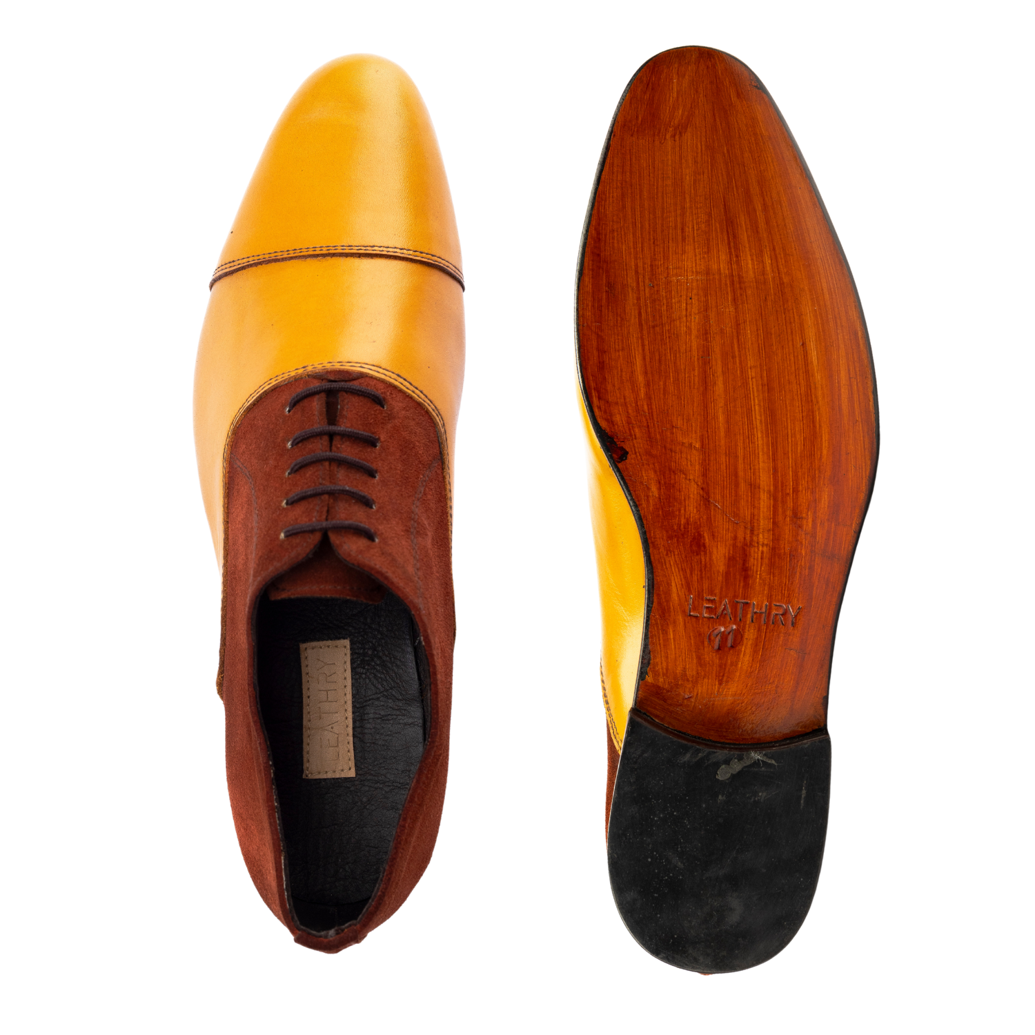 Brown leather shoe with wooden sole on a white background