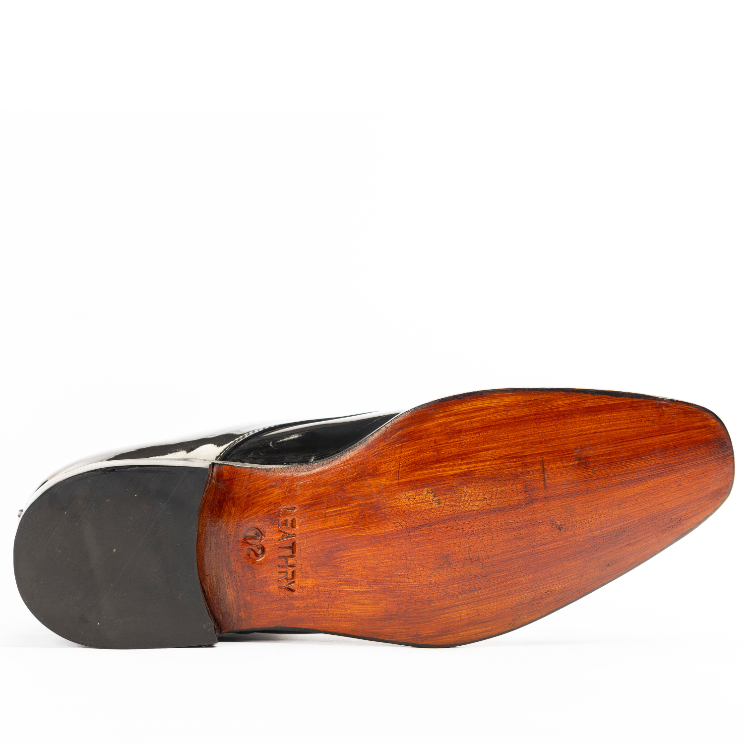 Wooden shoe last on a white background