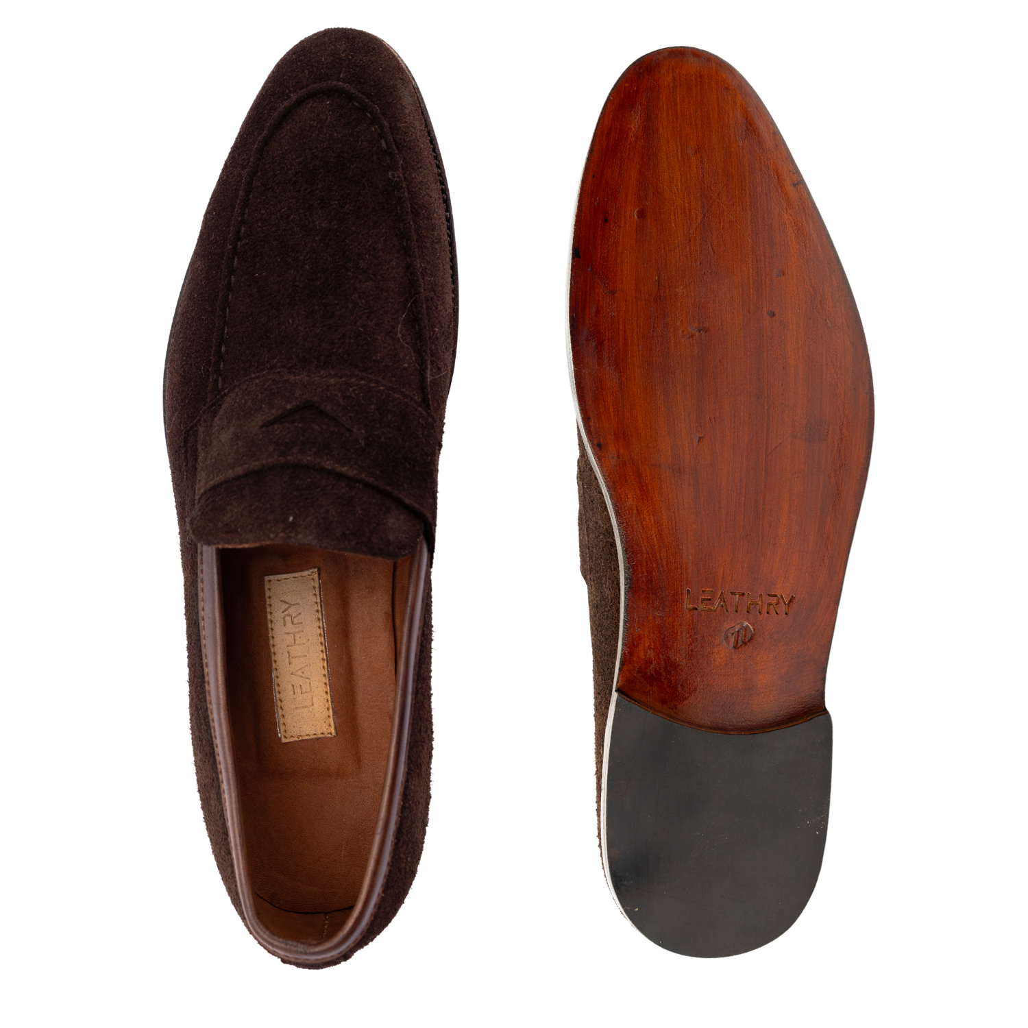 Brown suede loafer shoes with wooden sole on a white background