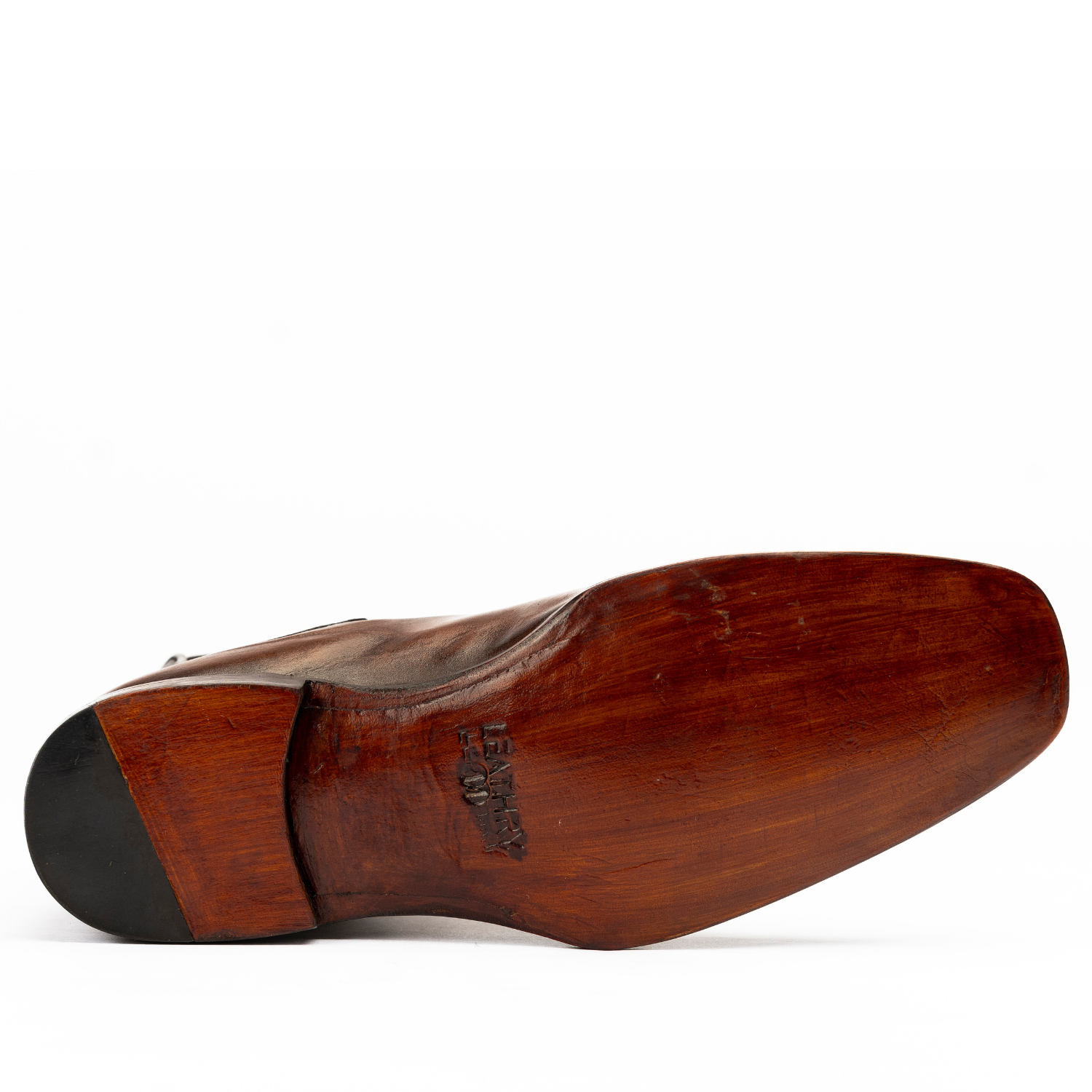 Wooden shoe last on a white background