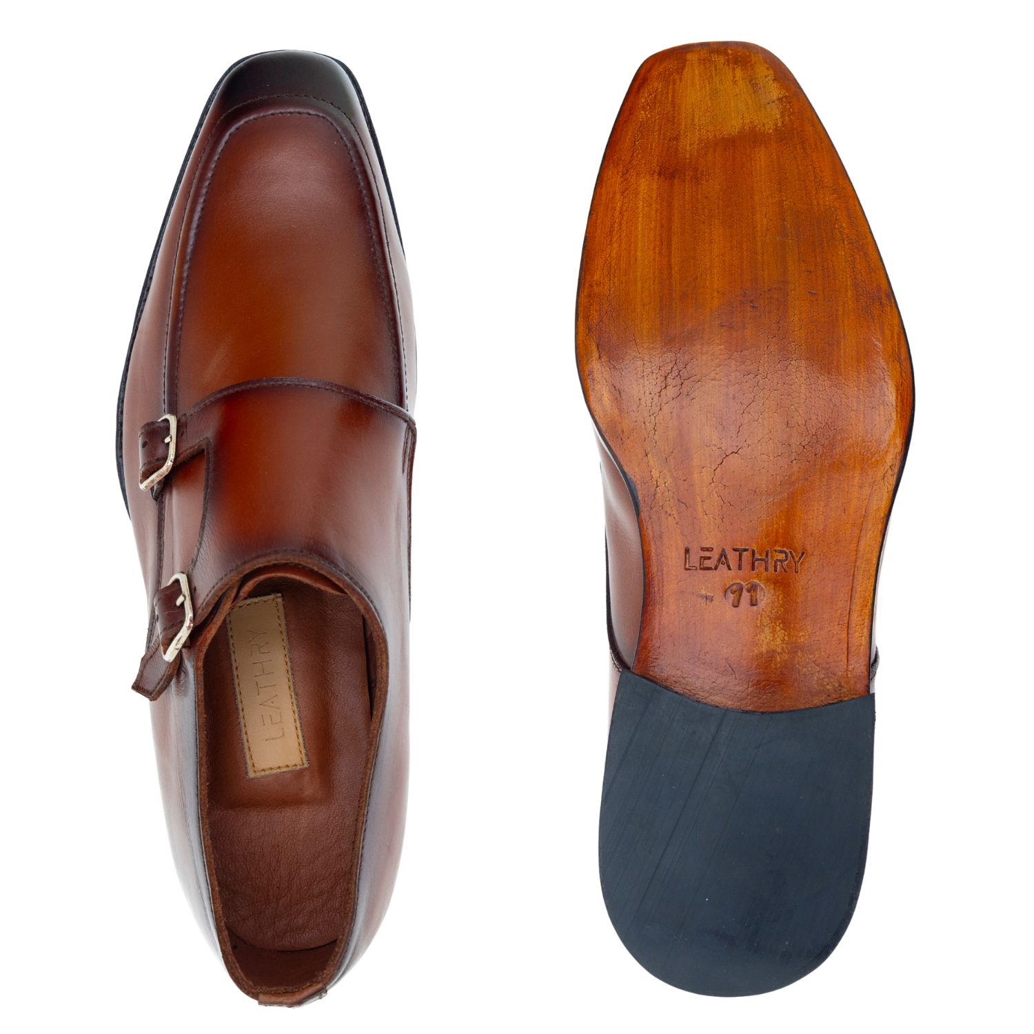 Brown leather shoe with a visible brand name on a white background