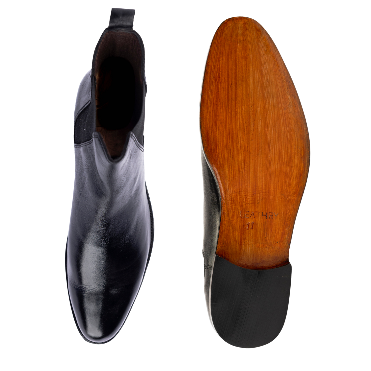 Black leather boot with wooden sole on a white background