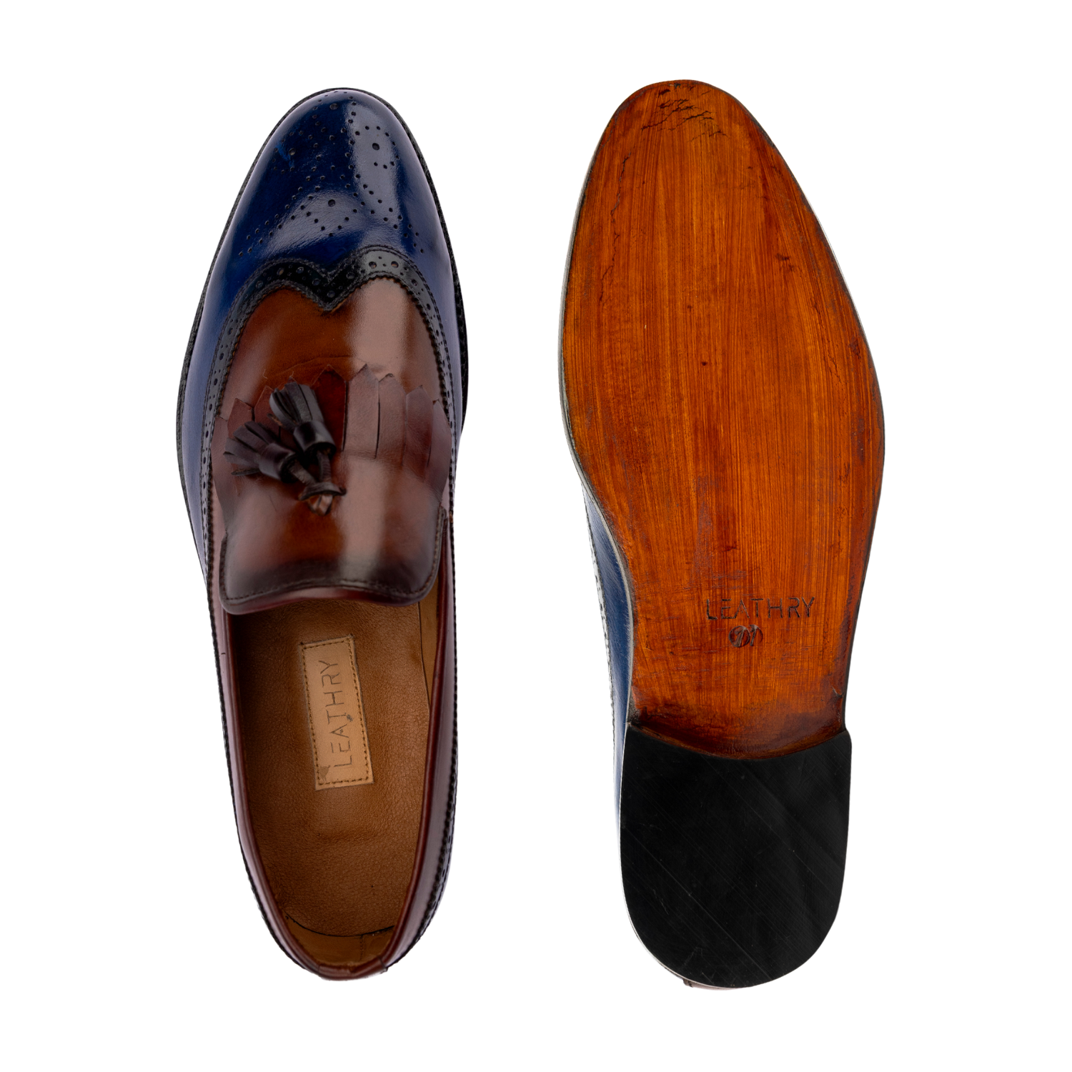 Top and bottom views of a polished leather loafer with tassel on a white background