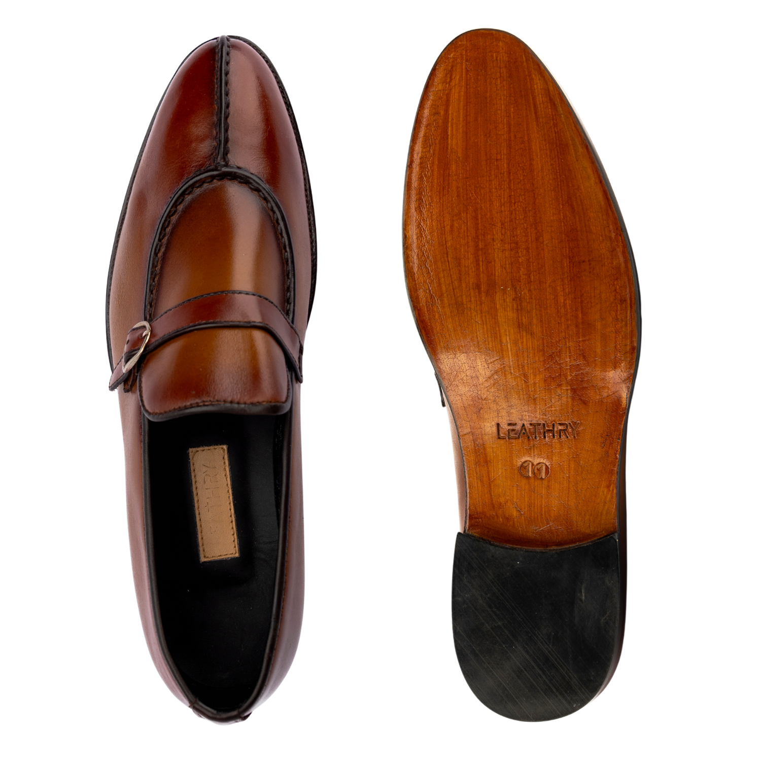 Brown leather loafer shoe with a visible brand name on a white background