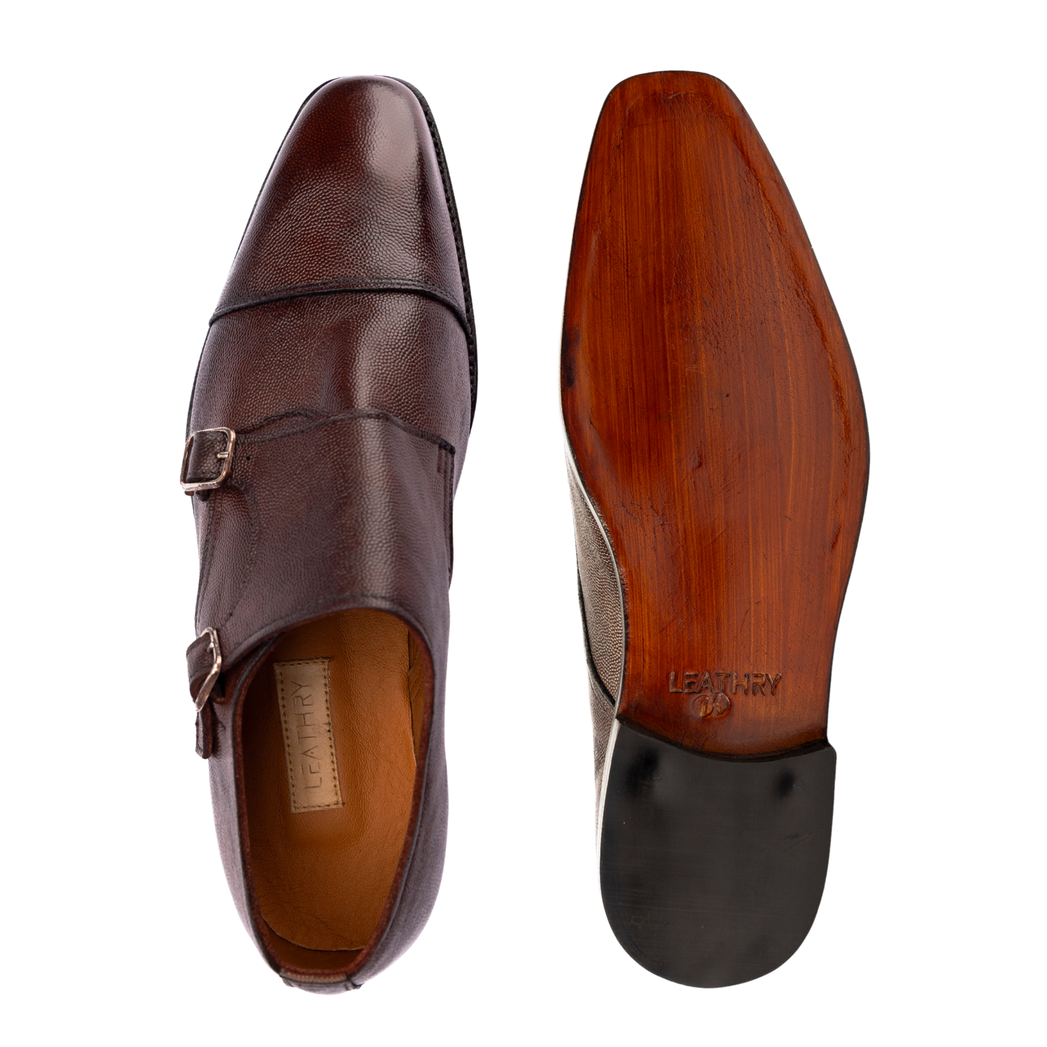 Brown leather dress shoe with wooden sole on a white background