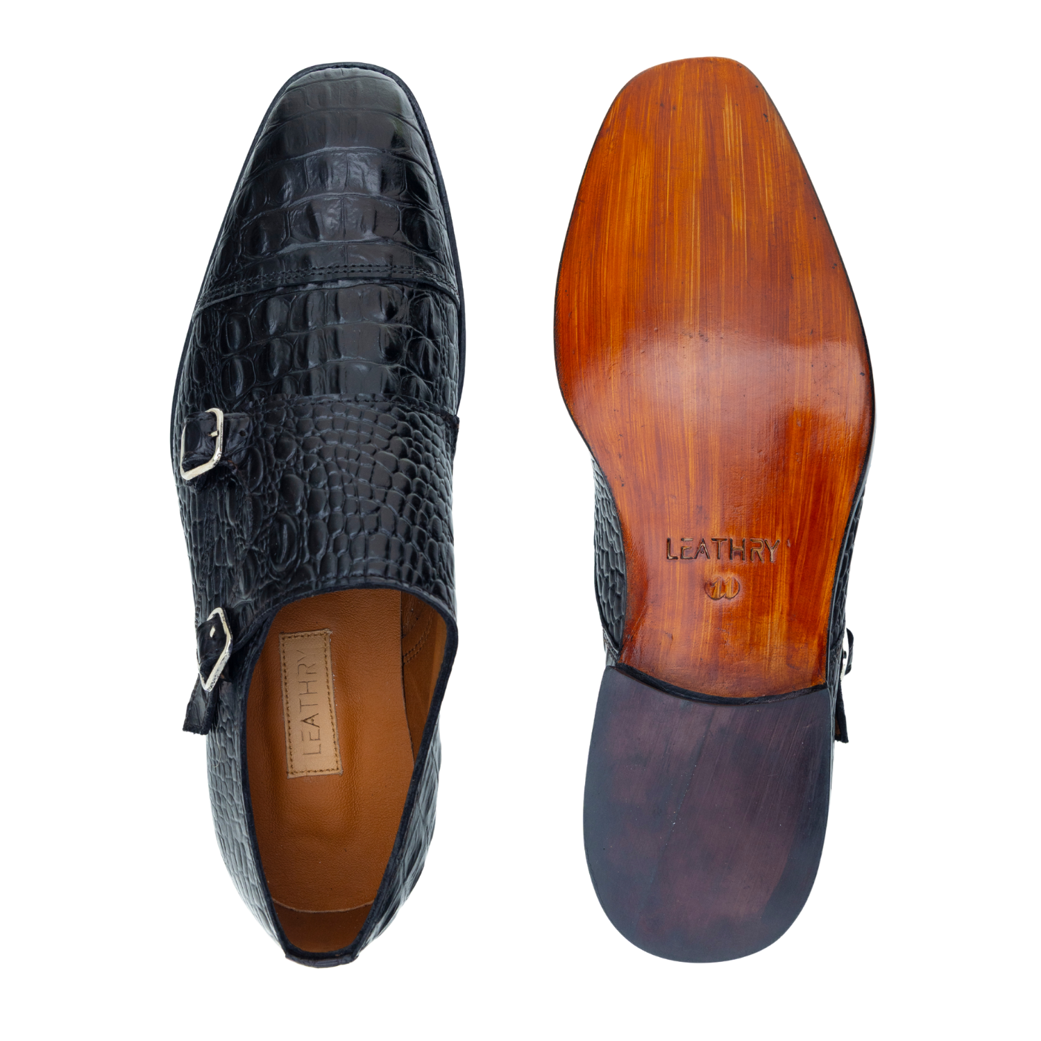 Black crocodile-patterned shoe with wooden sole on a white background
