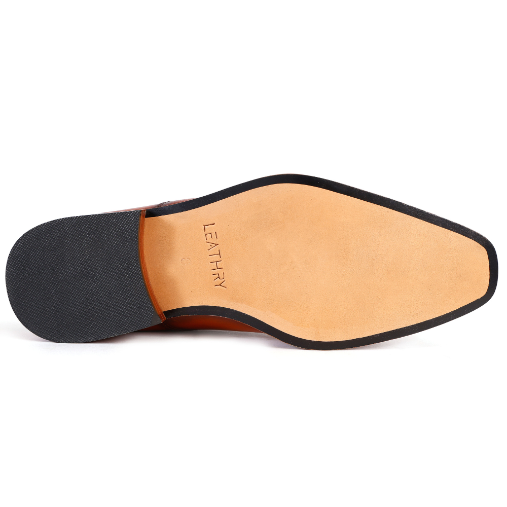 Close-up of a shoe sole with 'Leathry' branding on a white background