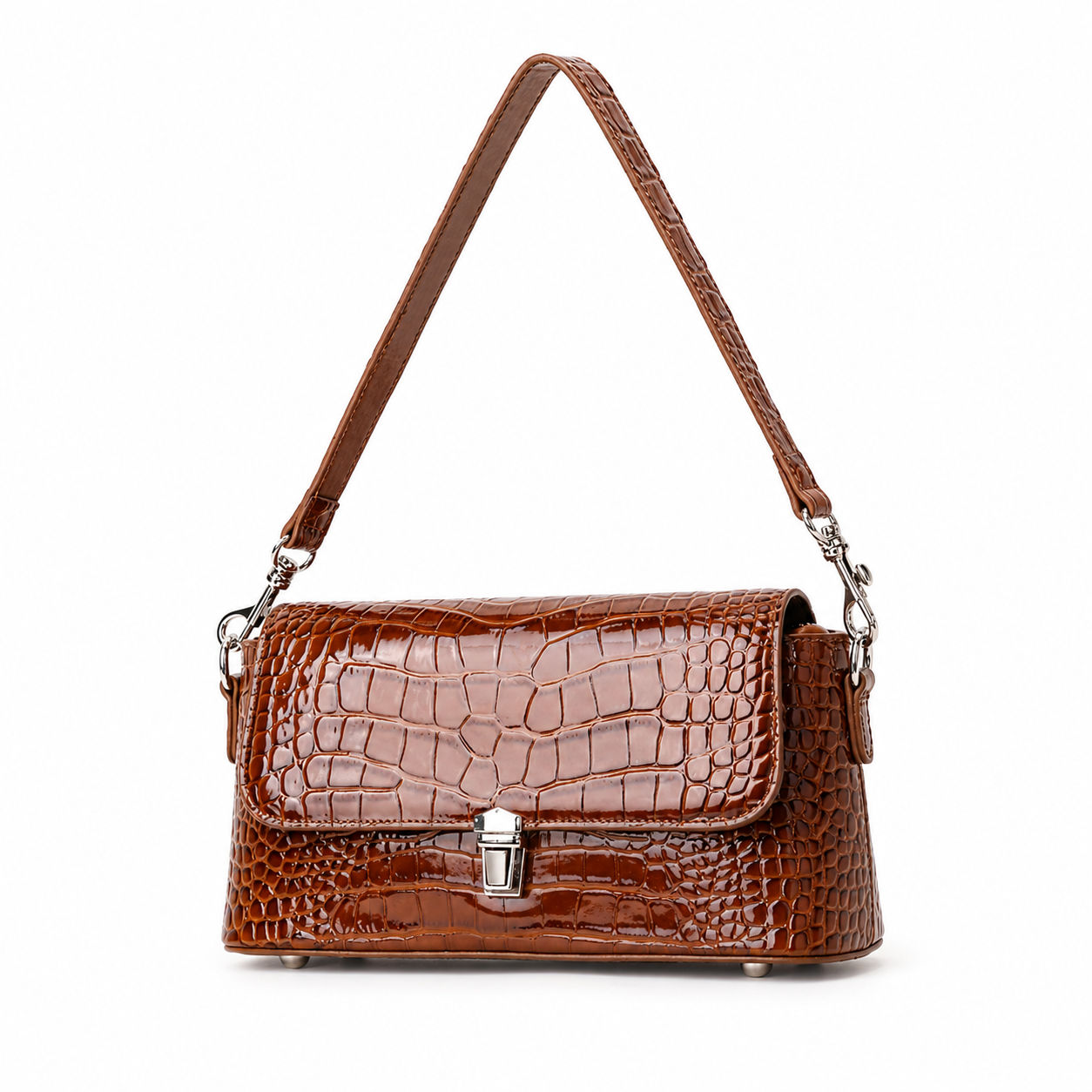 A brown crocodile-embossed leather shoulder bag with a front flap, silver-tone clasp, and matching shoulder strap, shown on a plain white background.