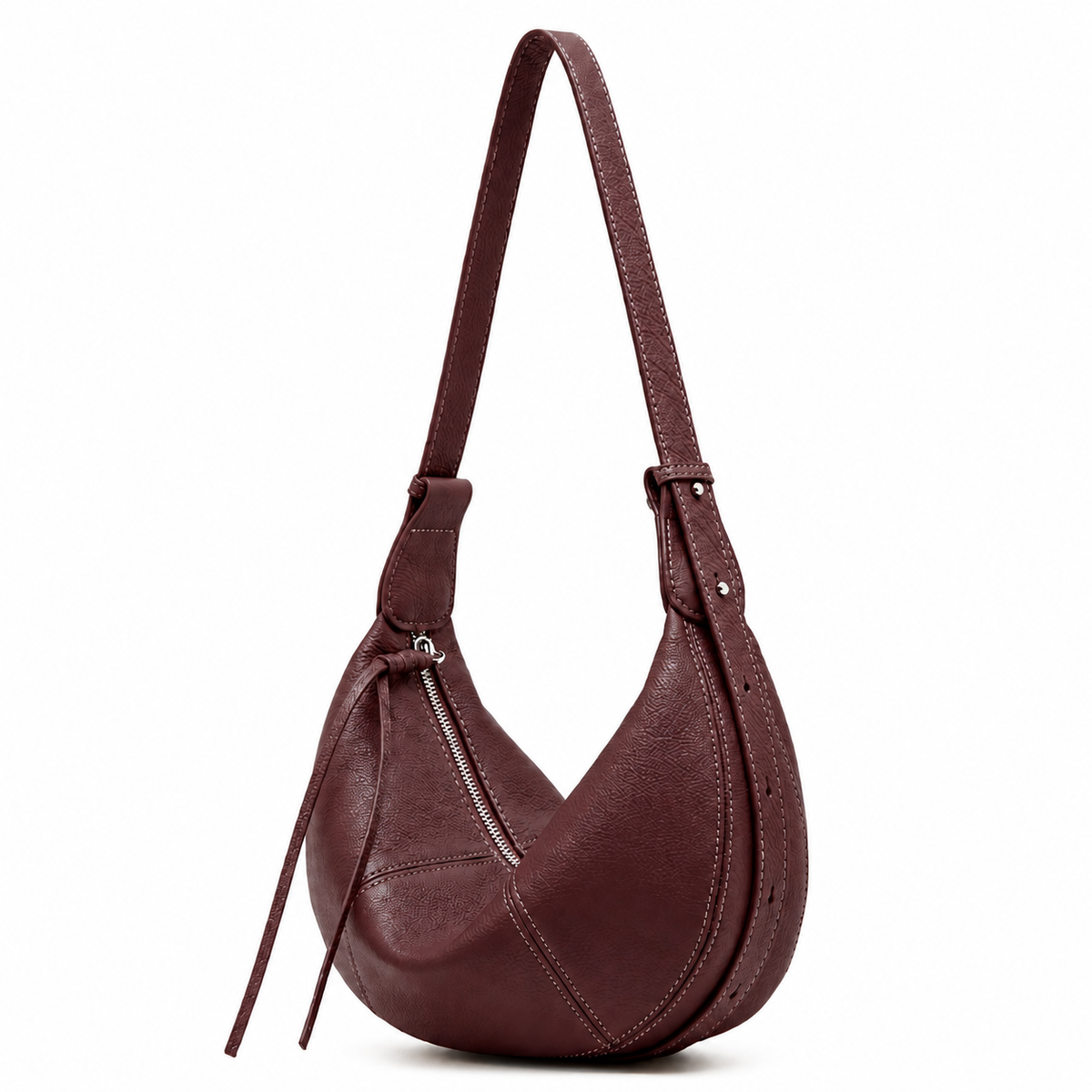 A dark burgundy leather crescent-shaped shoulder bag with a single shoulder strap, a diagonal zipper, and a hanging leather tie, shown against a plain white background.