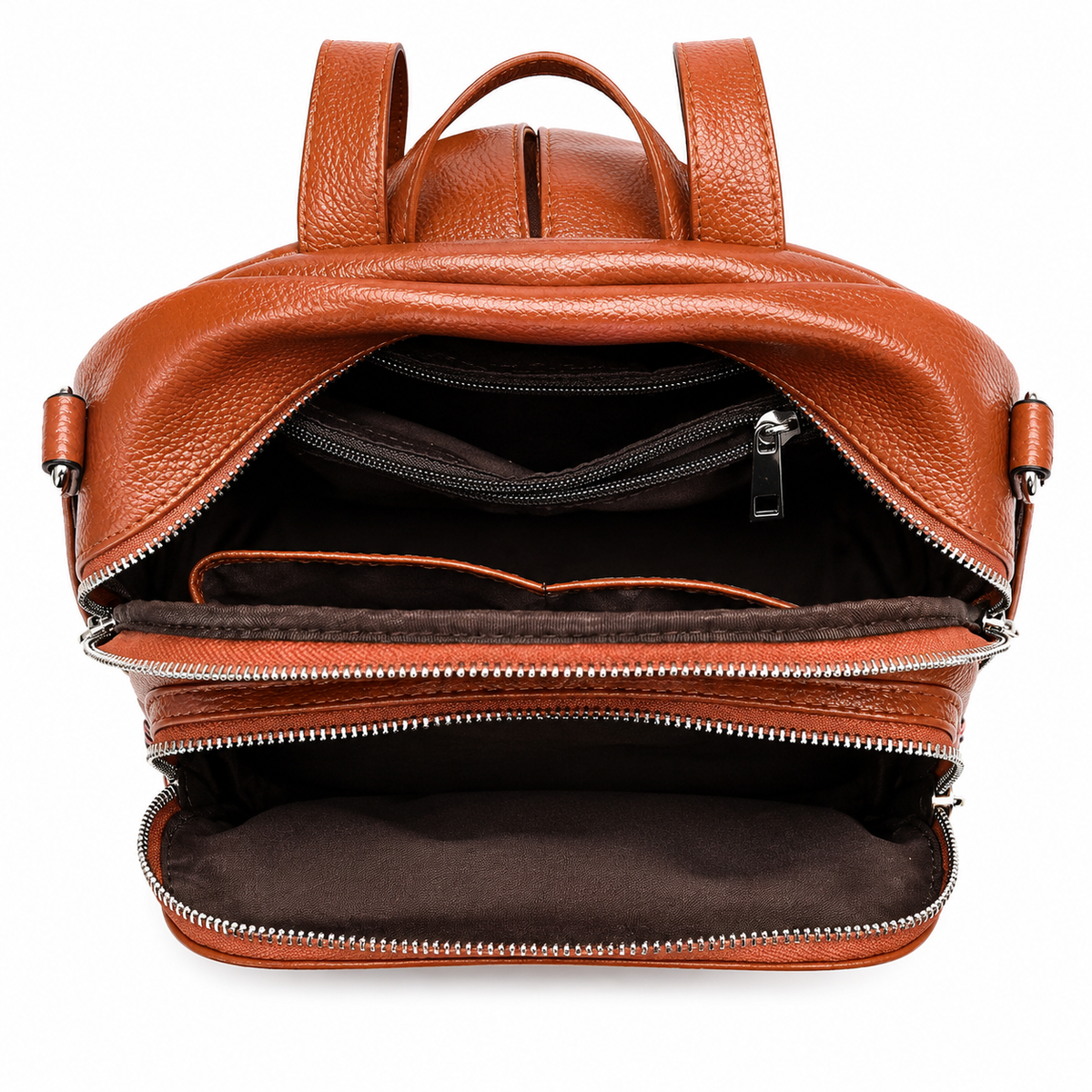 A brown pebbled leather backpack shown open from the front, displaying its interior compartments, dark brown lining, and silver zippers against a white background.