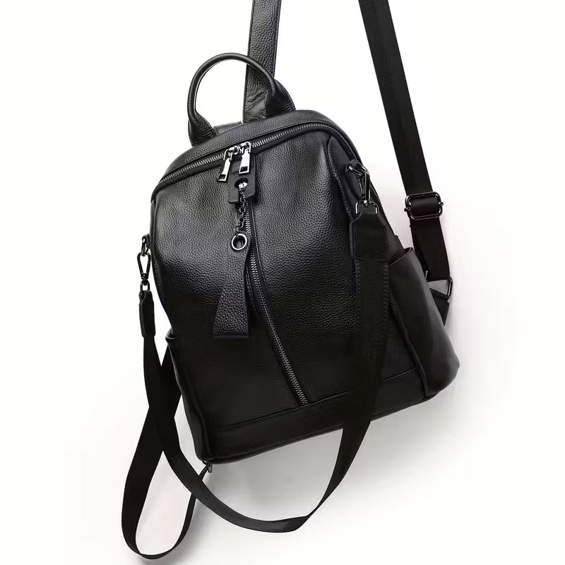 Black leather backpack on a white background