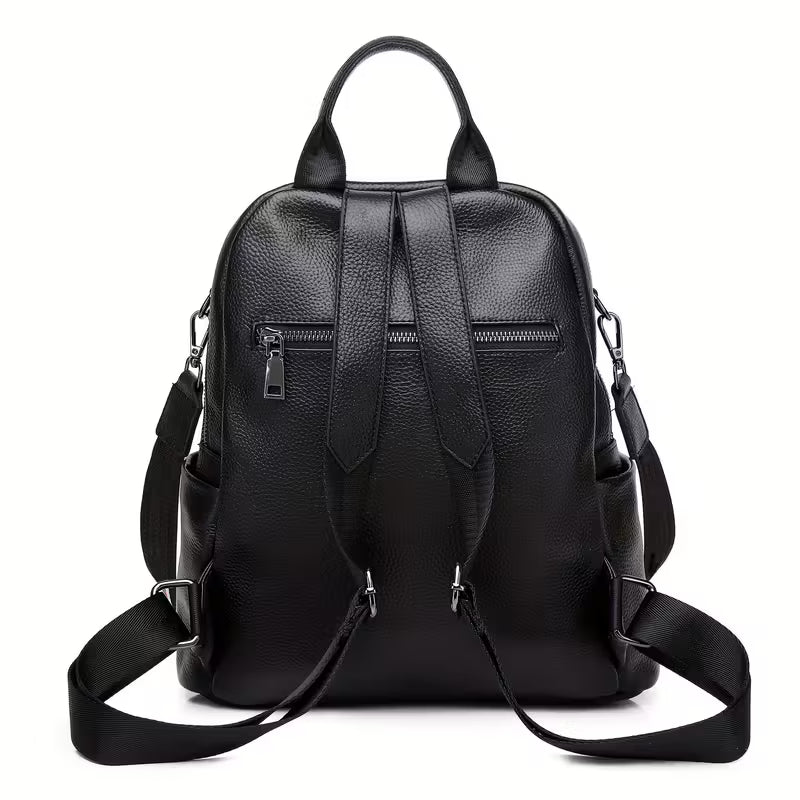 Black leather backpack on a white background