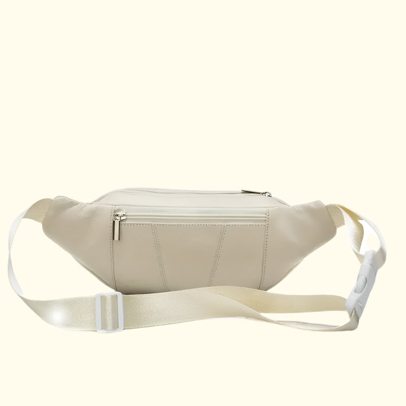 Beige waist bag with a strap on a white background